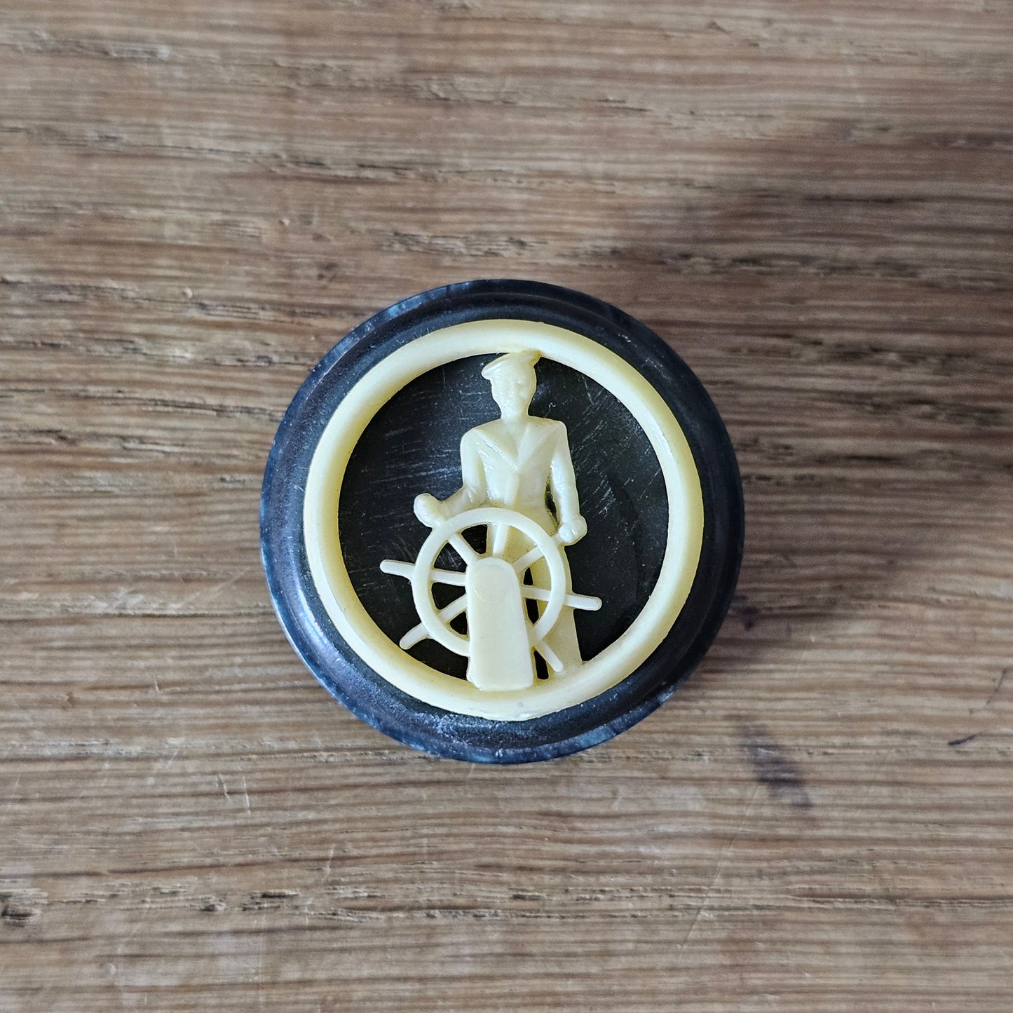 Home-made brooch using vintage plastic cocktail stirrer & vintage button