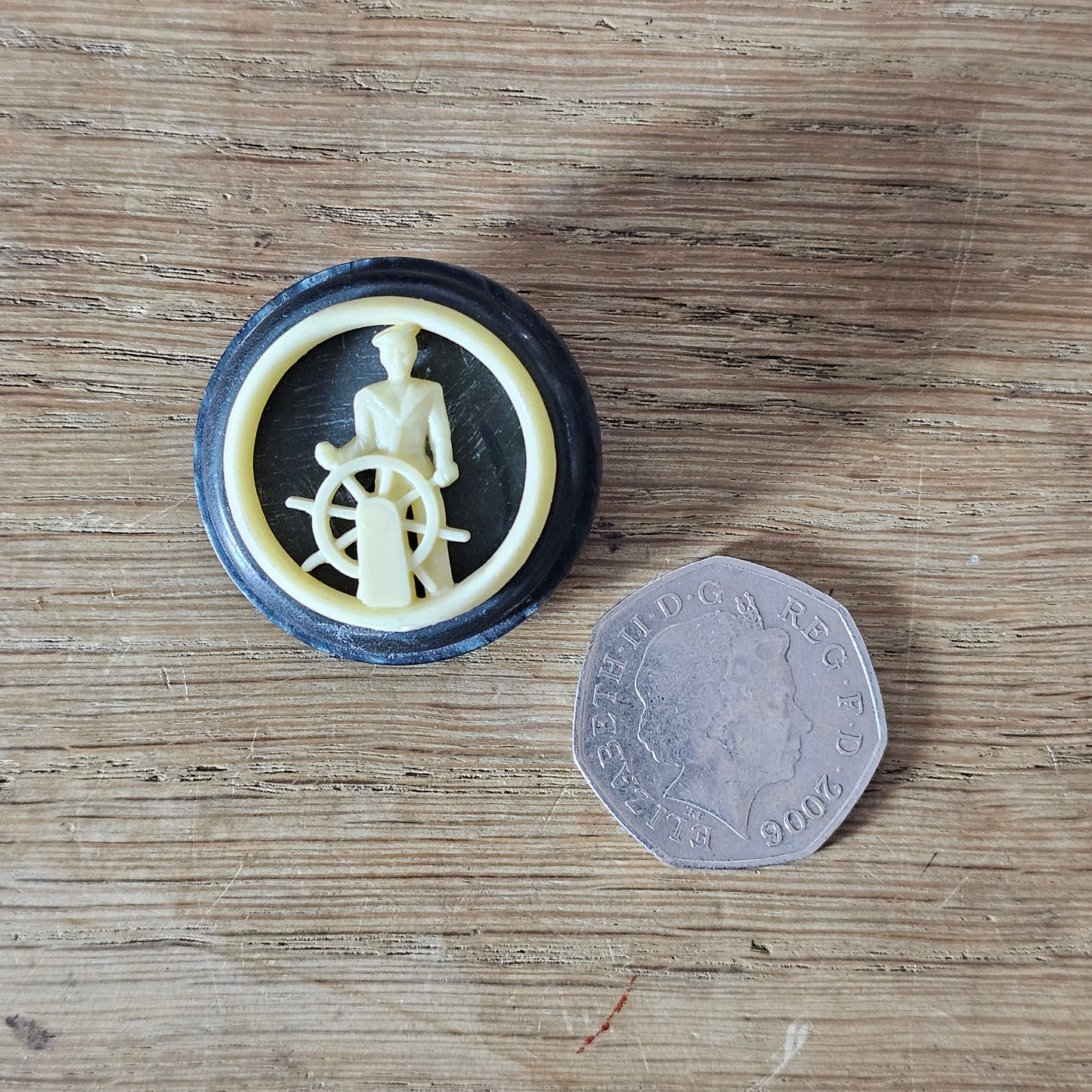 Home-made brooch using vintage plastic cocktail stirrer & vintage button