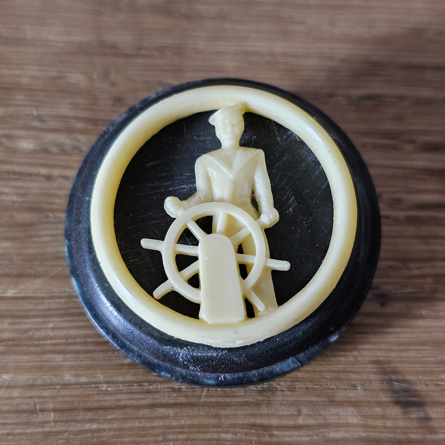 Home-made brooch using vintage plastic cocktail stirrer & vintage button