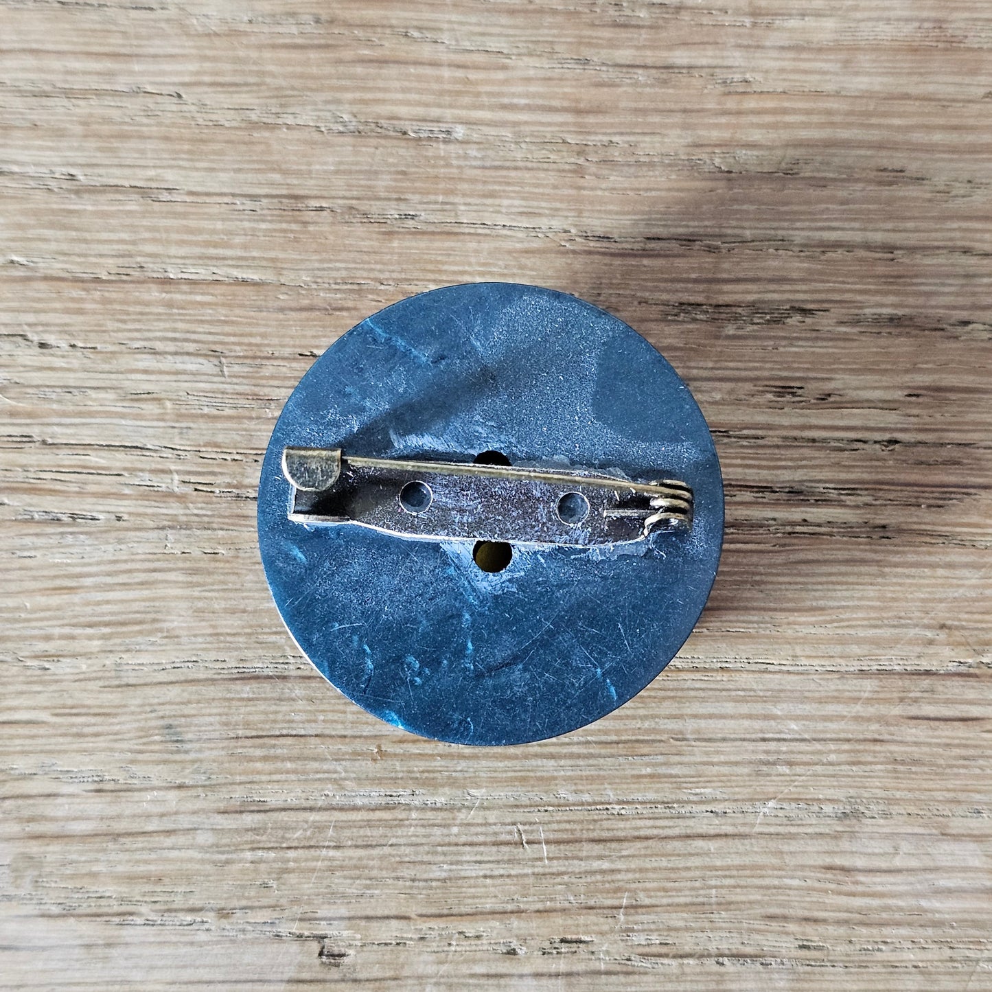 Home-made brooch using vintage plastic cocktail stirrer & vintage button