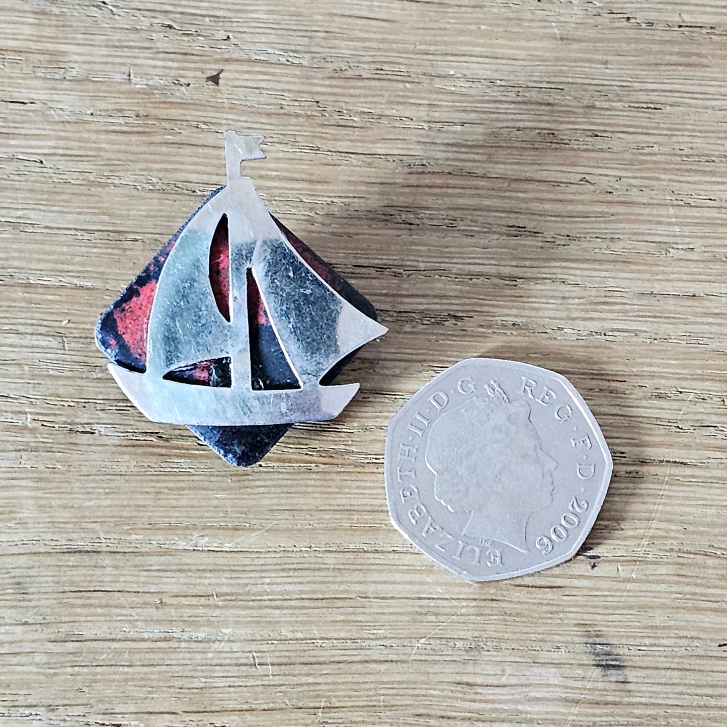 Home-made brooch using vintage minature metal yacht & vintage enamel jewellery piece