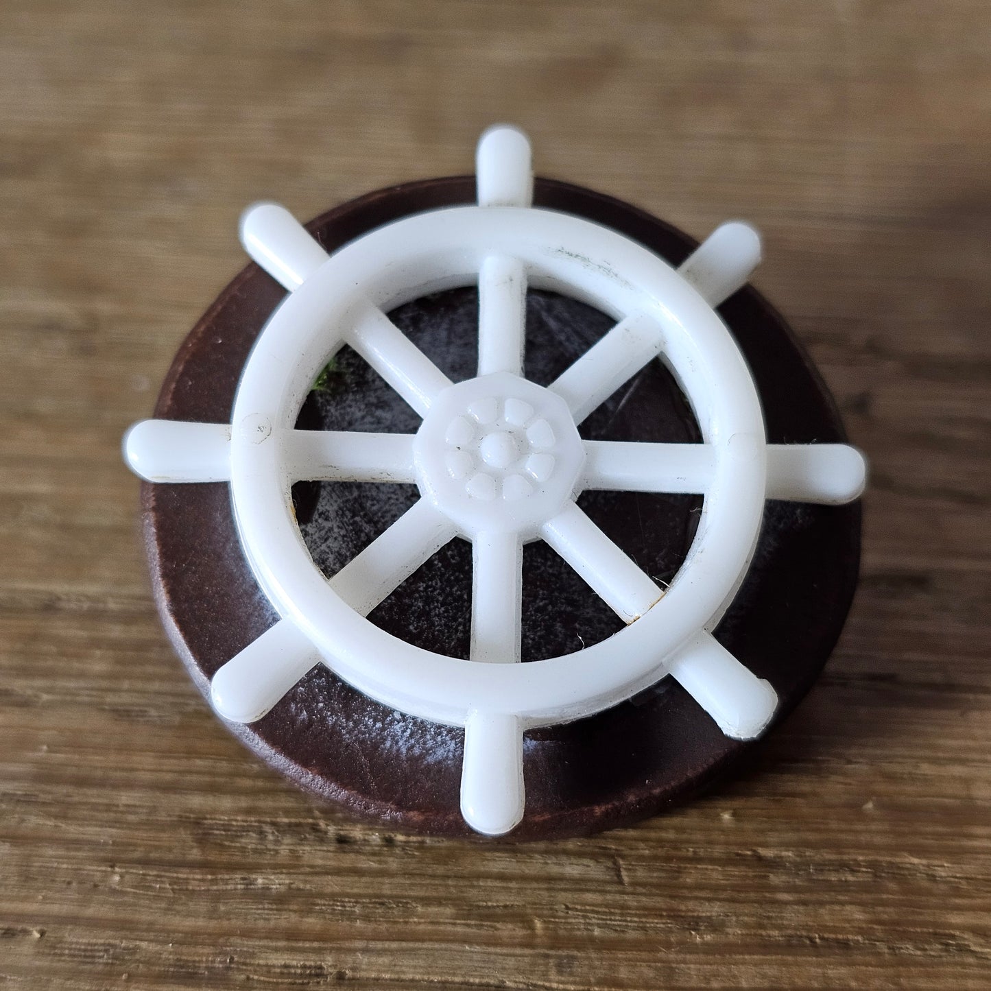 Home-made brooch using vintage plastic ships wheel and vintage wooden round bead