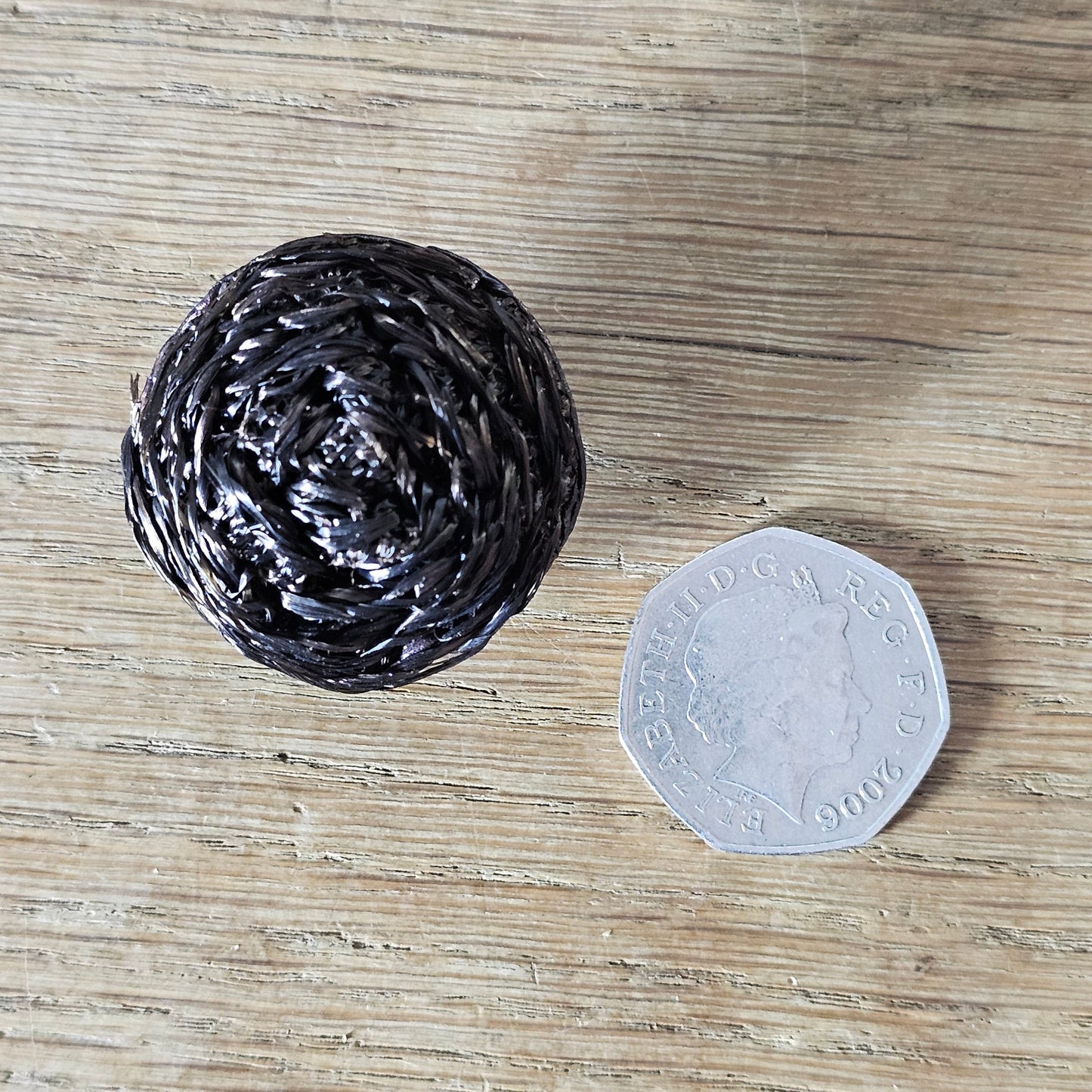 Handmade brooch using vintage dark brown ruched raffia domed button