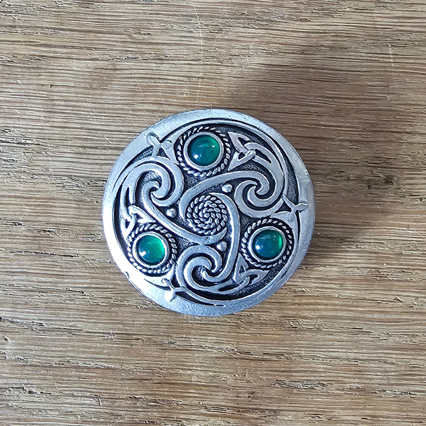 1980s Celtic pewter knotwork brooch with green glass cabochons