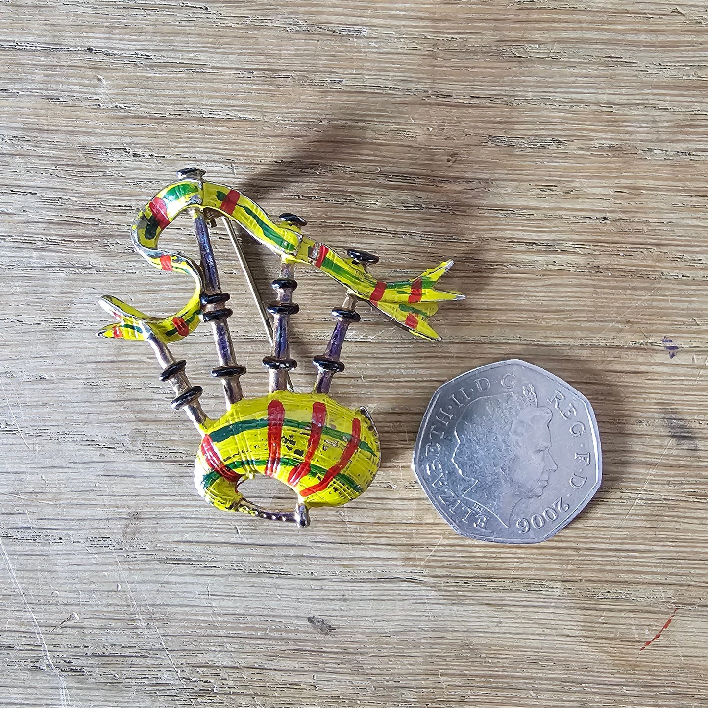 1930s/40s hand-painted yellow tartan Scottish bagpipes brooch