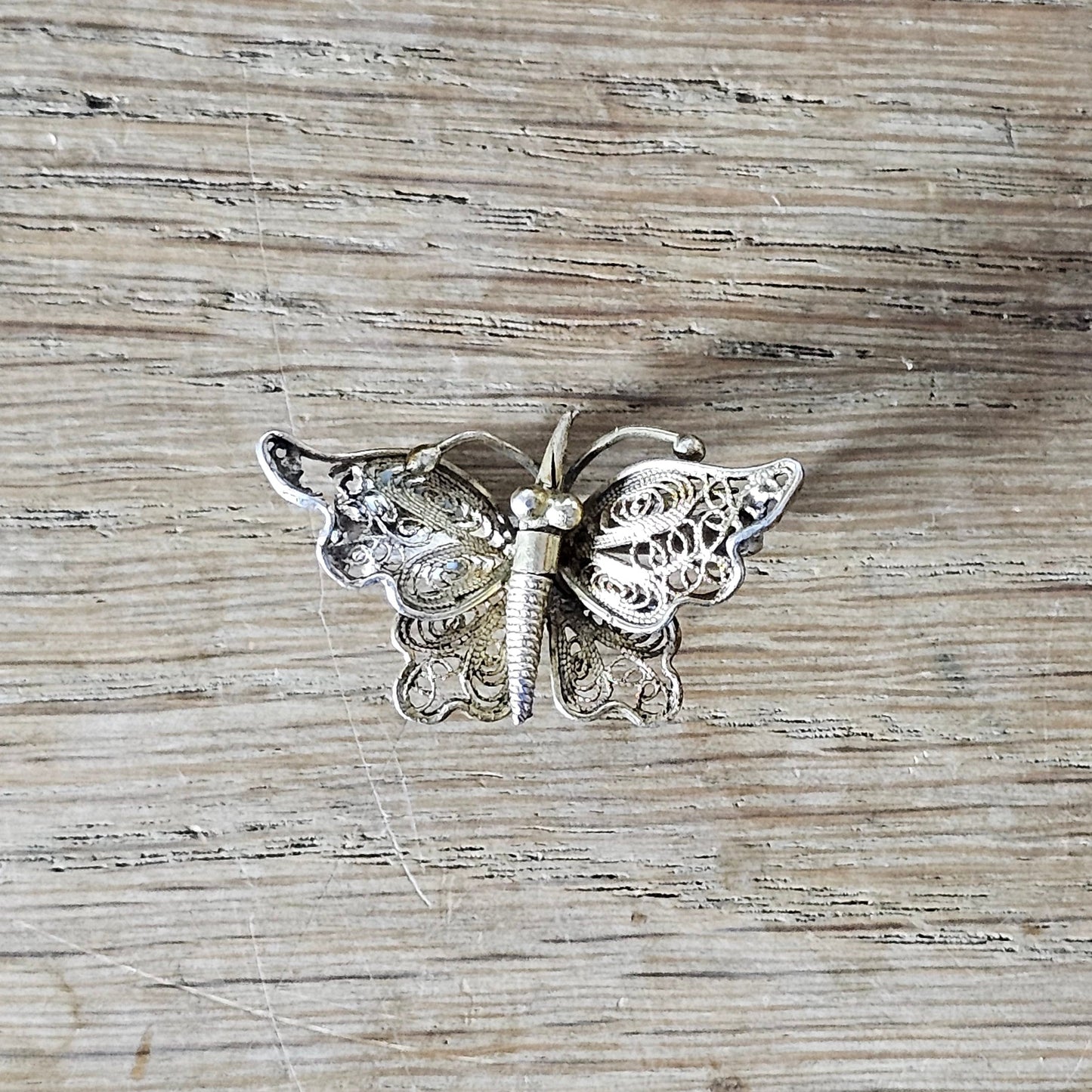 Antique sterling silver filigree butterfly brooch