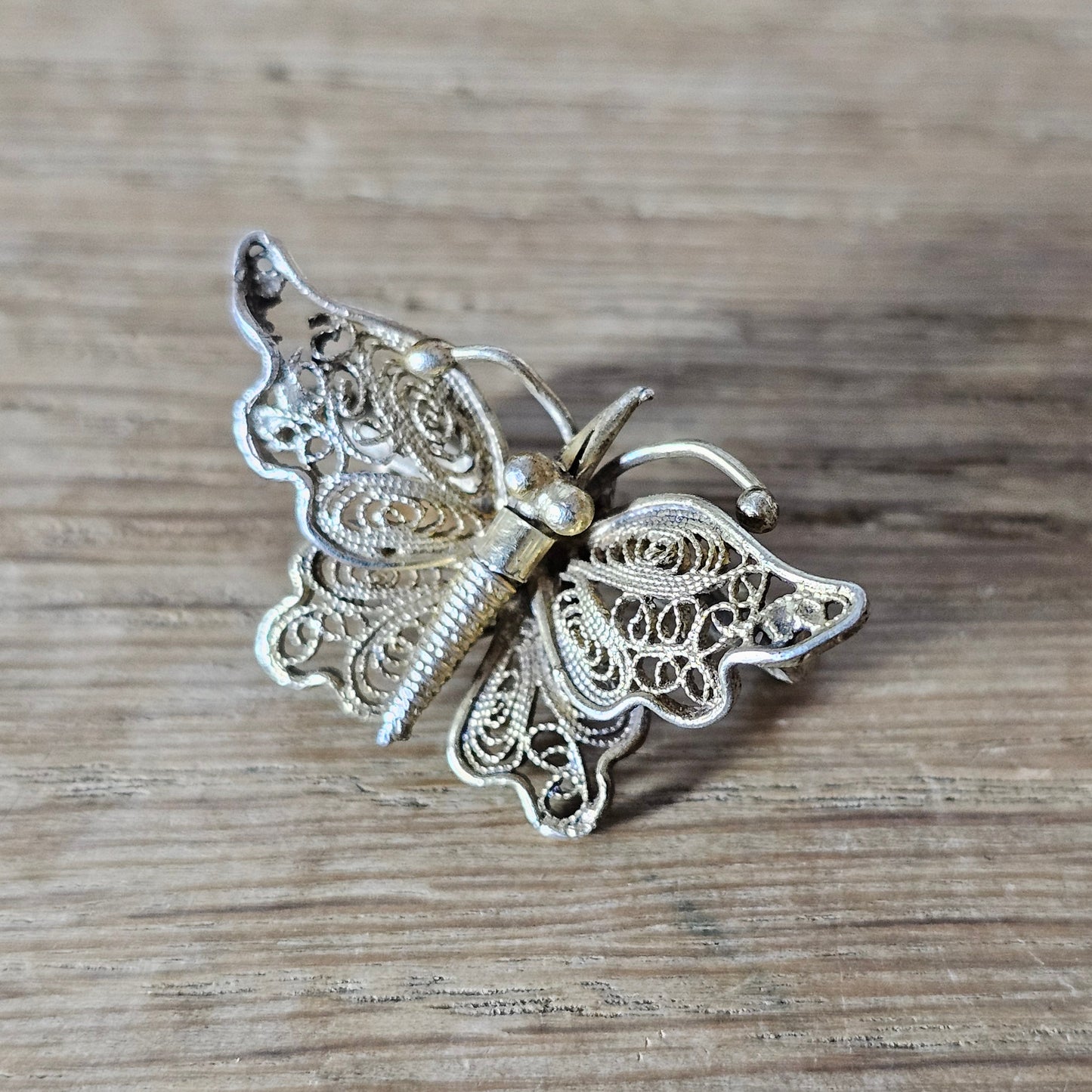 Antique sterling silver filigree butterfly brooch