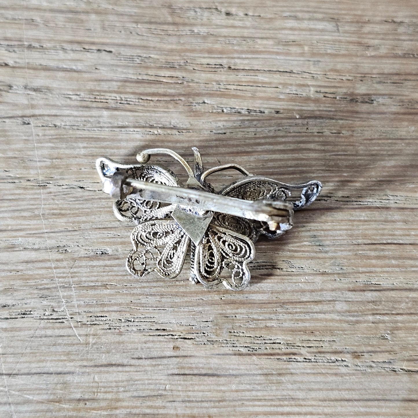 Antique sterling silver filigree butterfly brooch