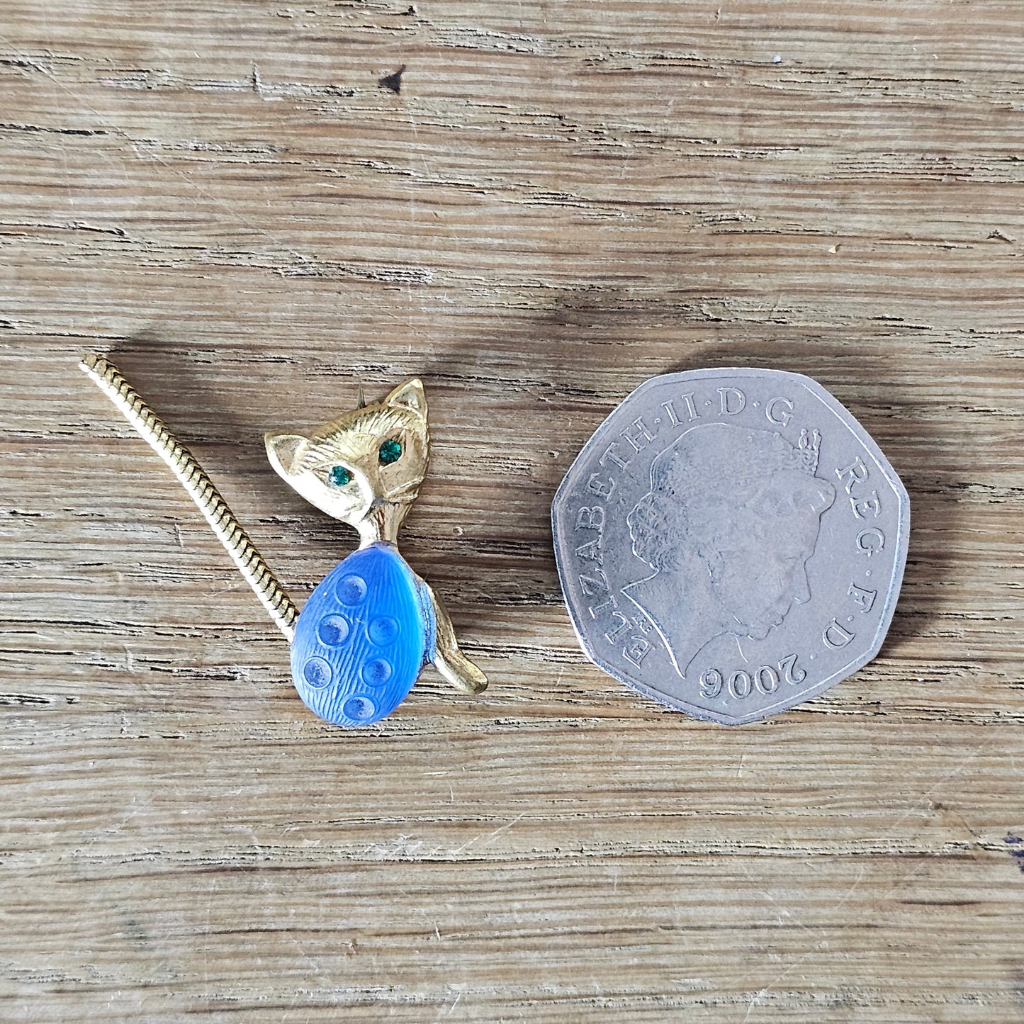 1960s Ges Gesch, Germany gold-tone blue glass jelly belly kitten brooch, stamped