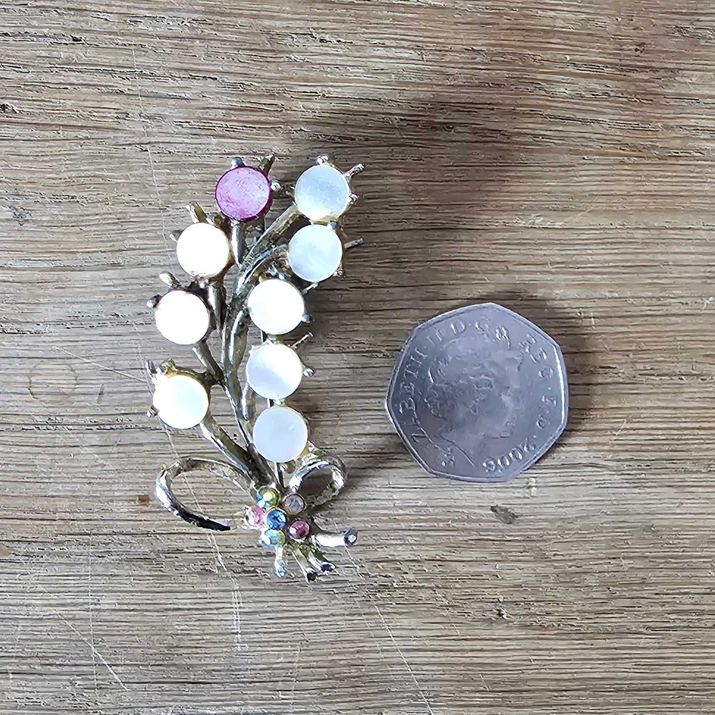 1960s leaf sprig brooch with pearlescent cabochon/flat disc detail
