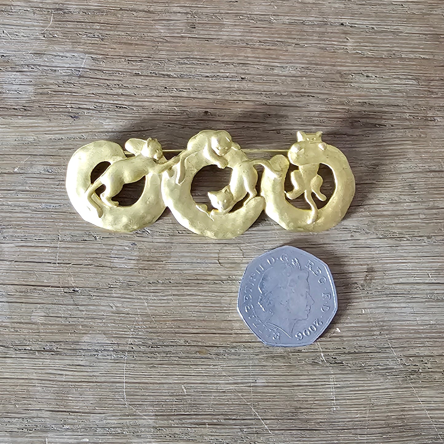1970s JJ Jonette gold-tone climbing cats brooch