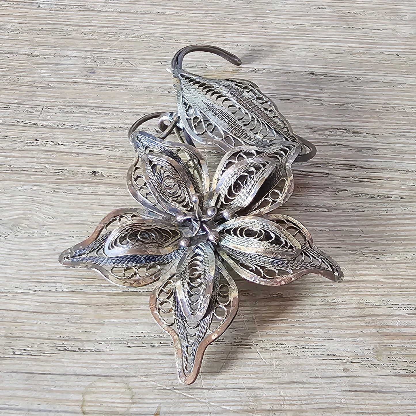 Antique copper filigree floral brooch