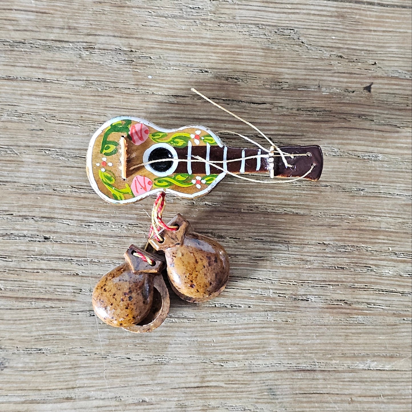 1940s hand-painted wooden guitar brooch with hanging maracas