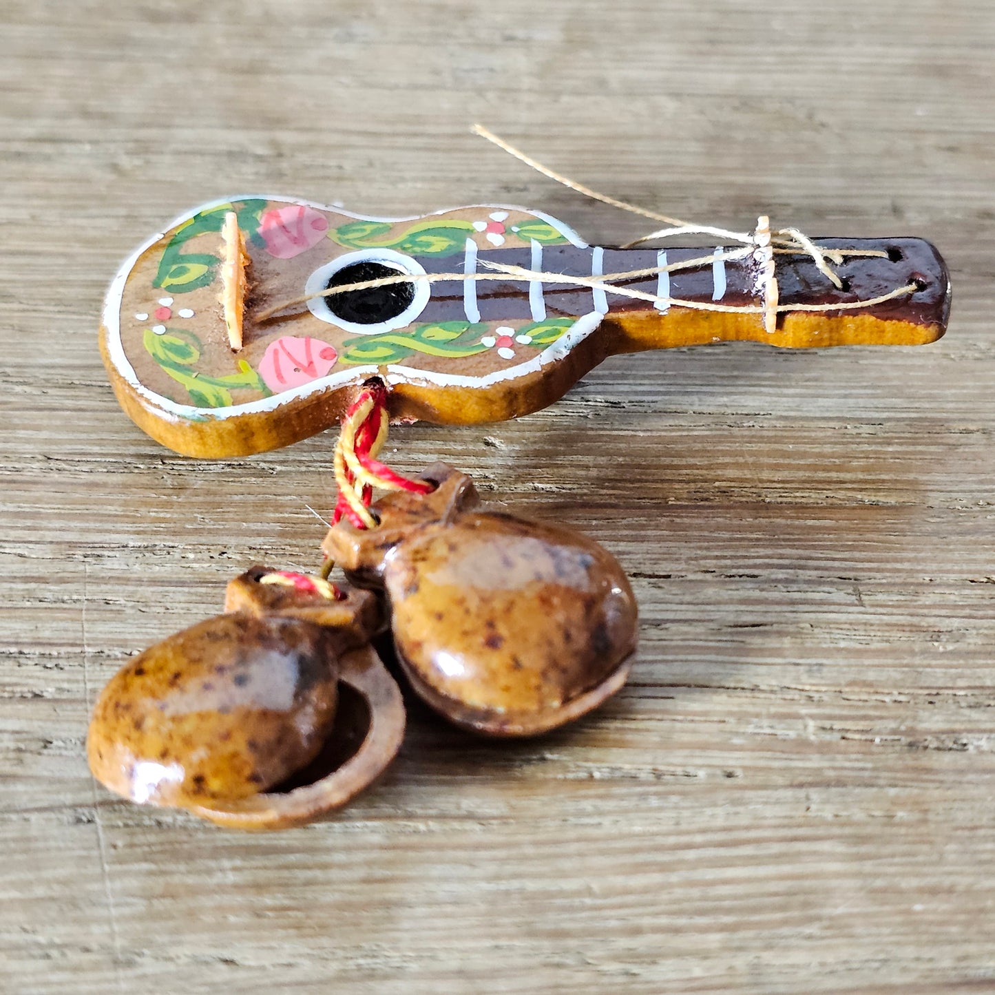 1940s hand-painted wooden guitar brooch with hanging maracas