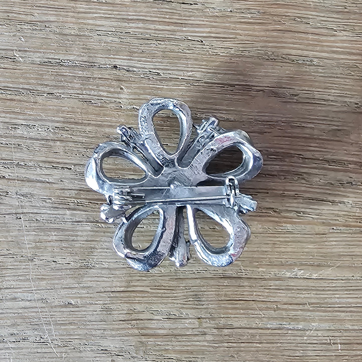 1960s silver-tone amber rhinestone flower brooch