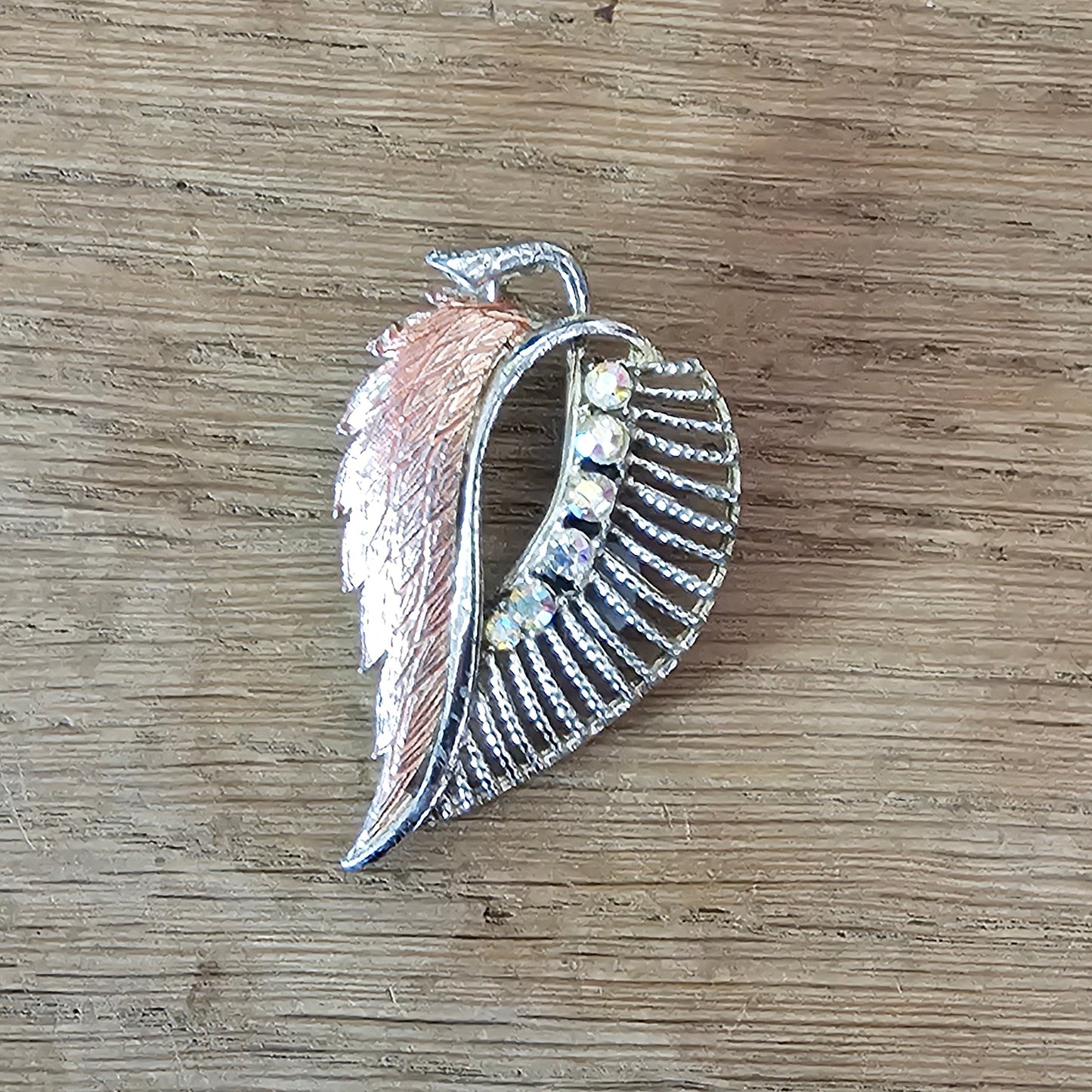 1960s pink enamel & Aurora Borealis rhinestone feather brooch