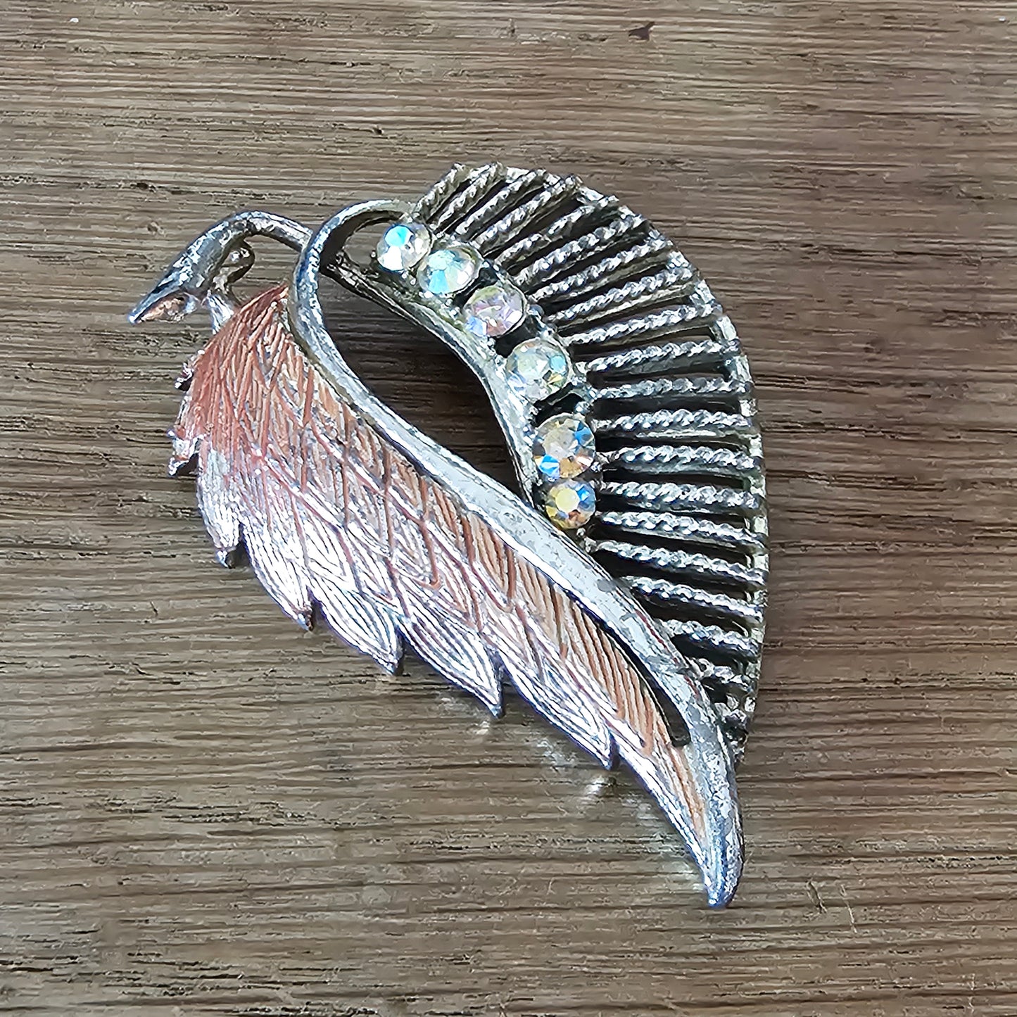 1960s pink enamel & Aurora Borealis rhinestone feather brooch