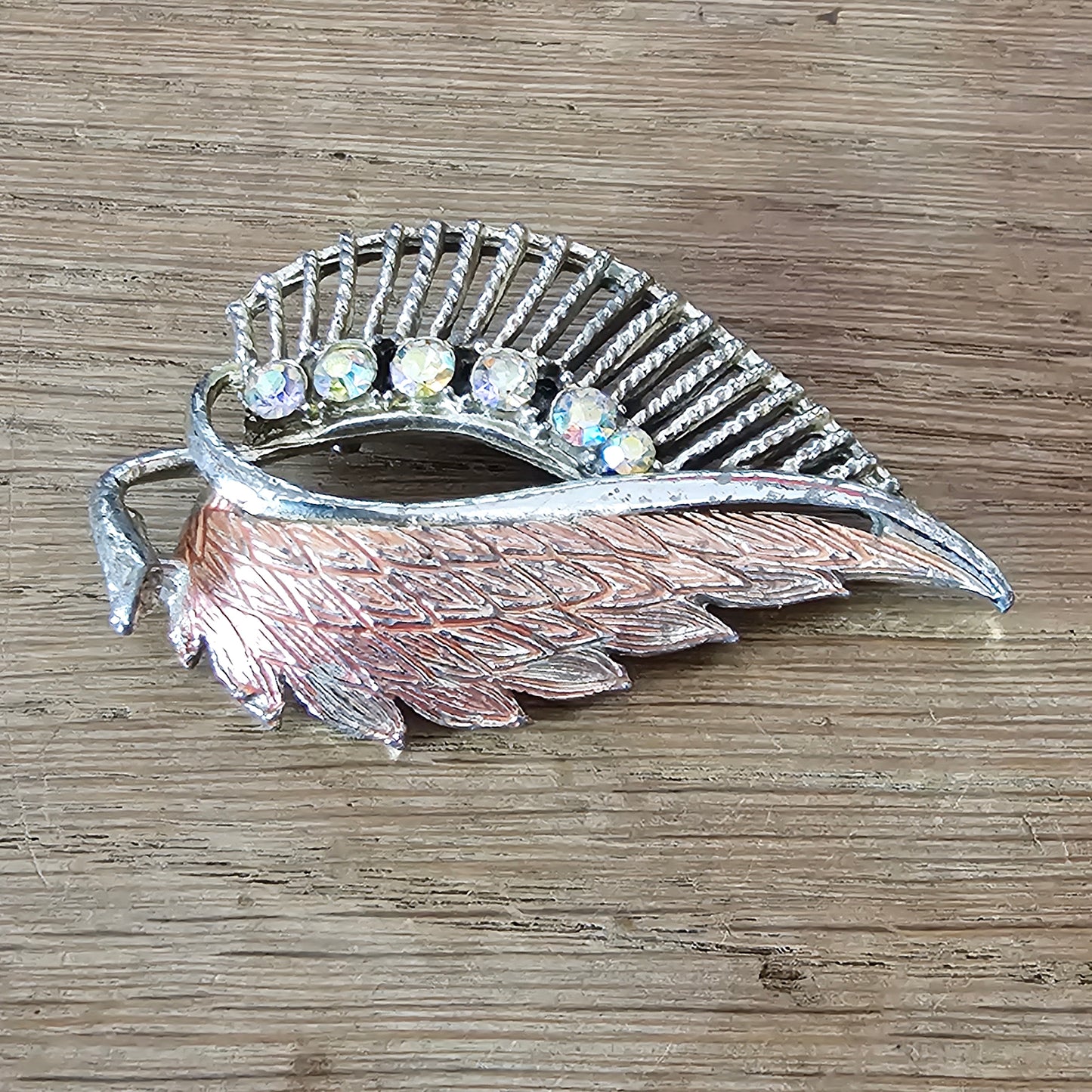 1960s pink enamel & Aurora Borealis rhinestone feather brooch