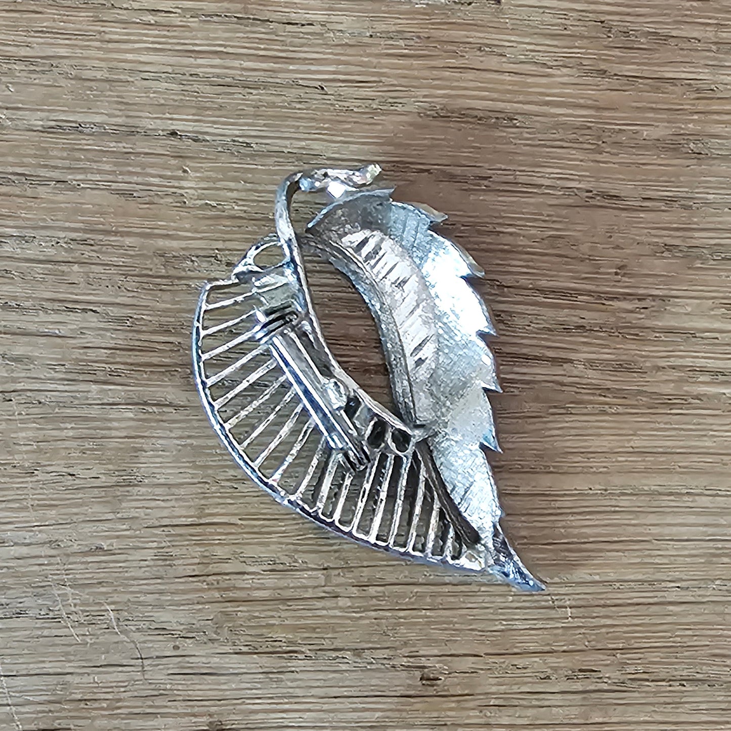 1960s pink enamel & Aurora Borealis rhinestone feather brooch