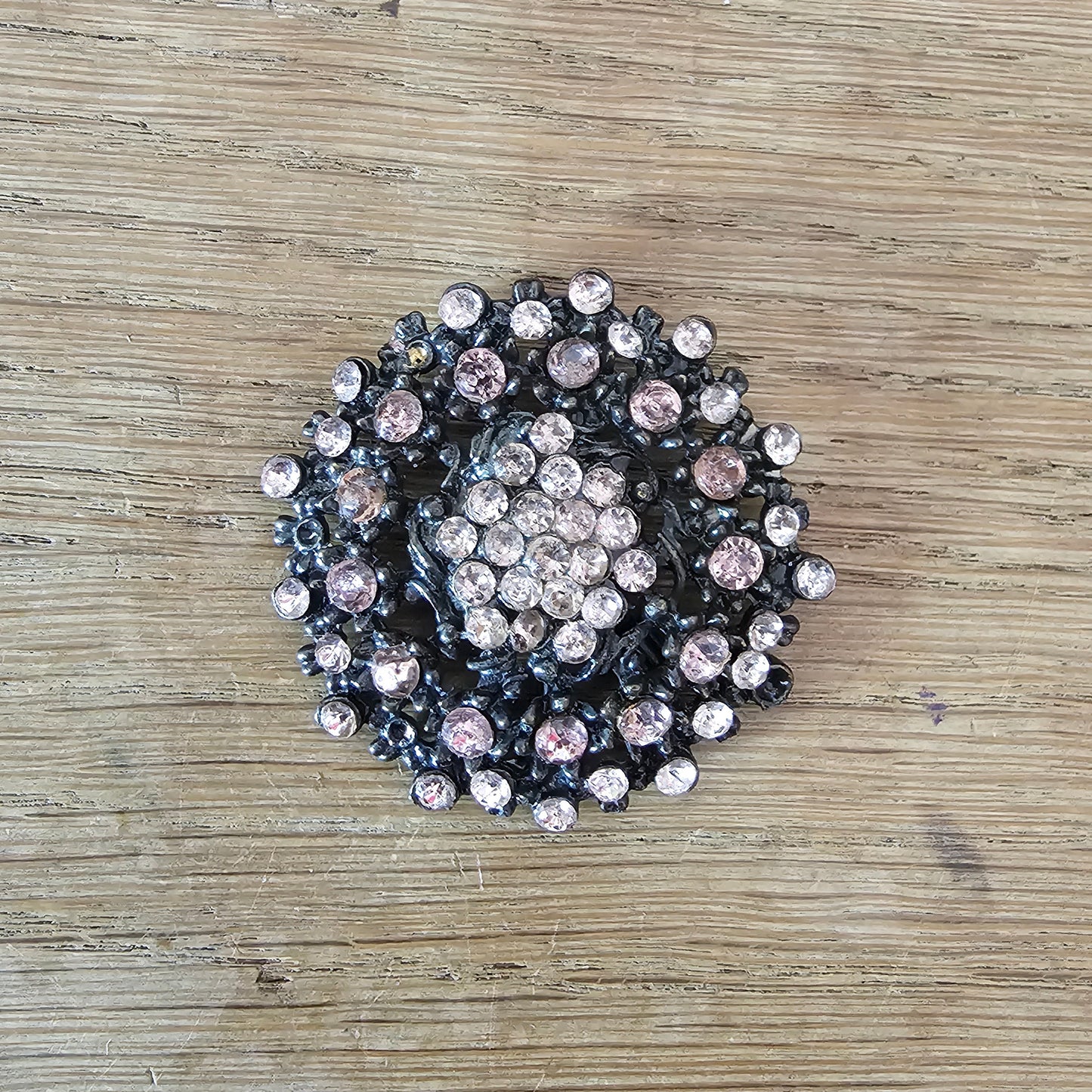 1950s gunmetal-tone & pink rhinestone floral brooch