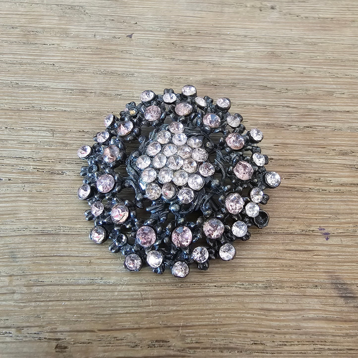 1950s gunmetal-tone & pink rhinestone floral brooch
