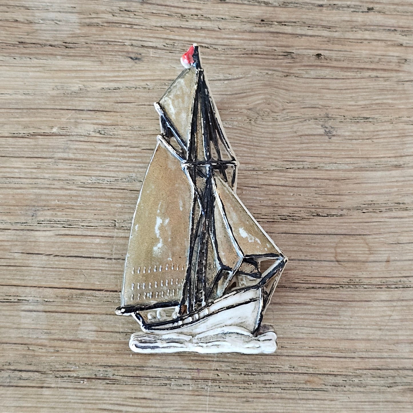 1930s/40s handpainted celluloid sailing boat brooch, made in England
