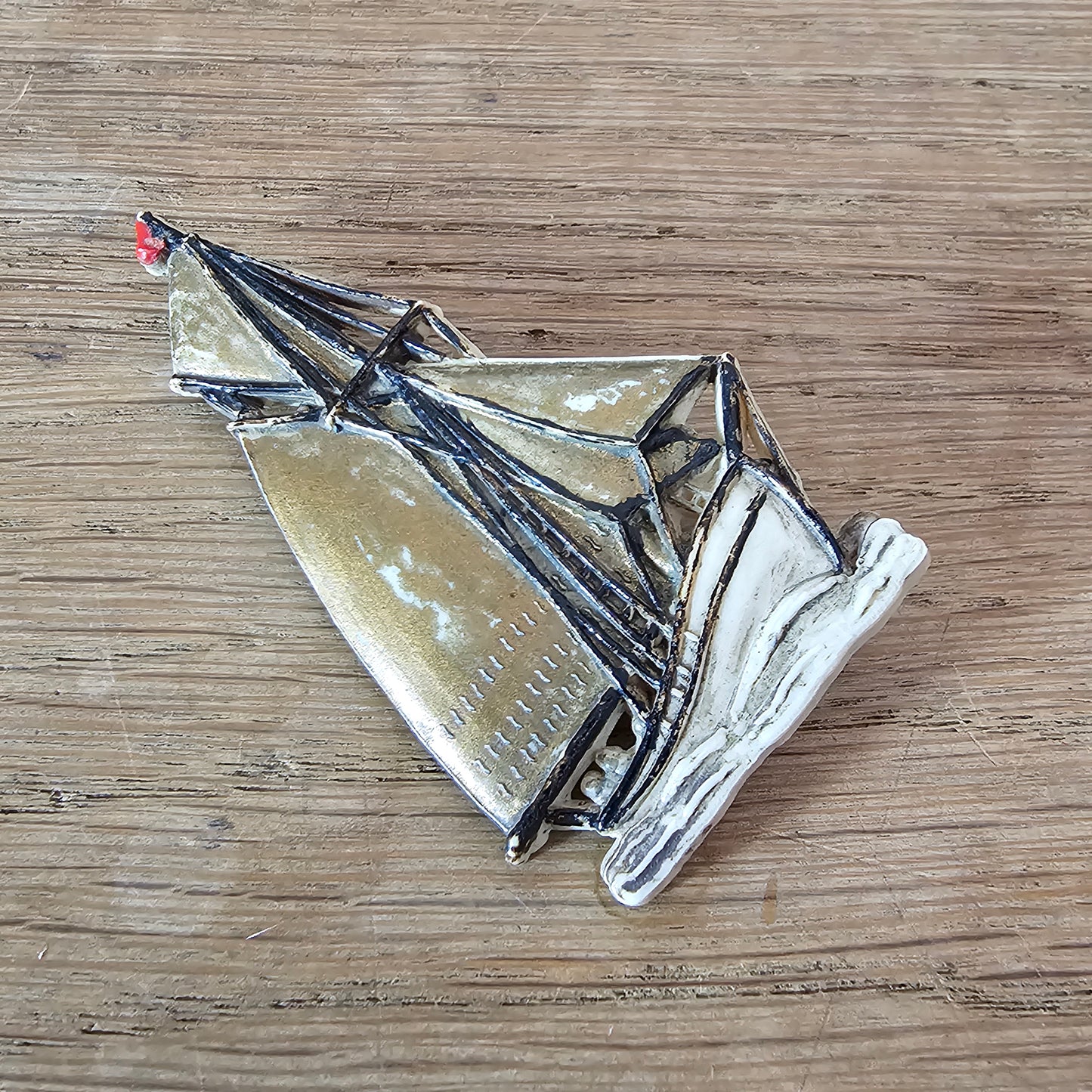 1930s/40s handpainted celluloid sailing boat brooch, made in England