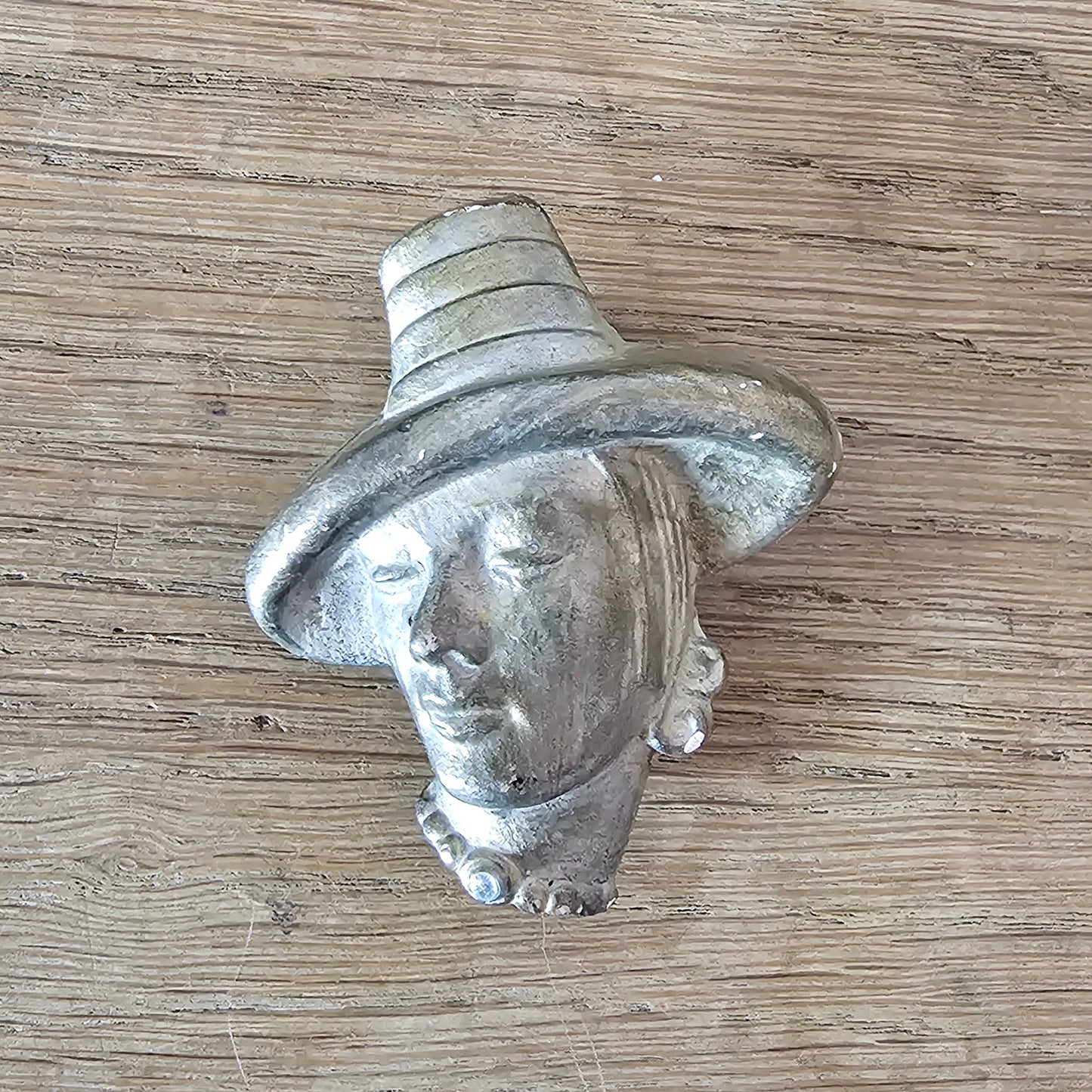 circa. 1940s gold-painted plaster/chalkware lady in hat head brooch