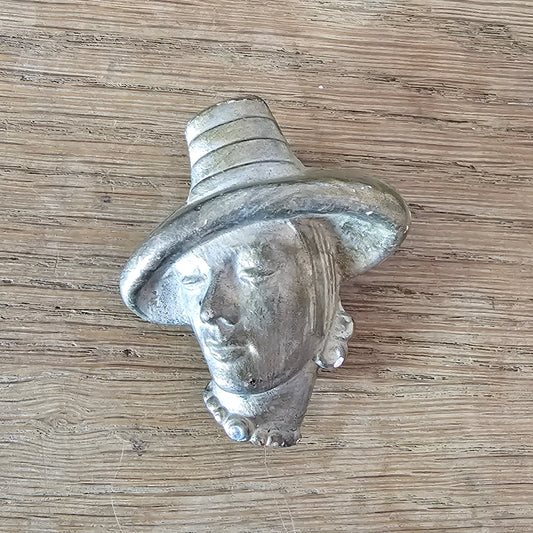 circa. 1940s gold-painted plaster/chalkware lady in hat head brooch
