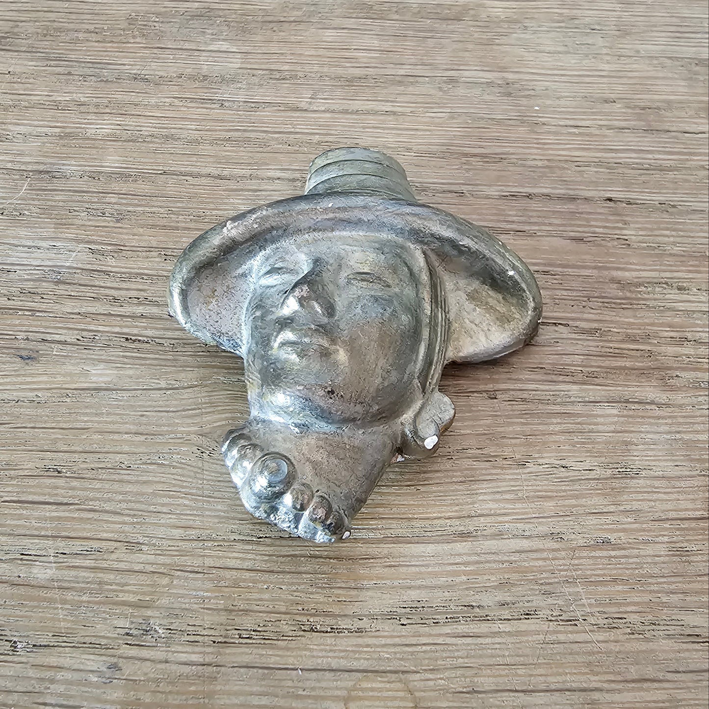 circa. 1940s gold-painted plaster/chalkware lady in hat head brooch
