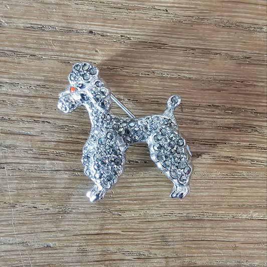 1950s silver-tone faux marcasite poodle dog brooch with rhinestone eye