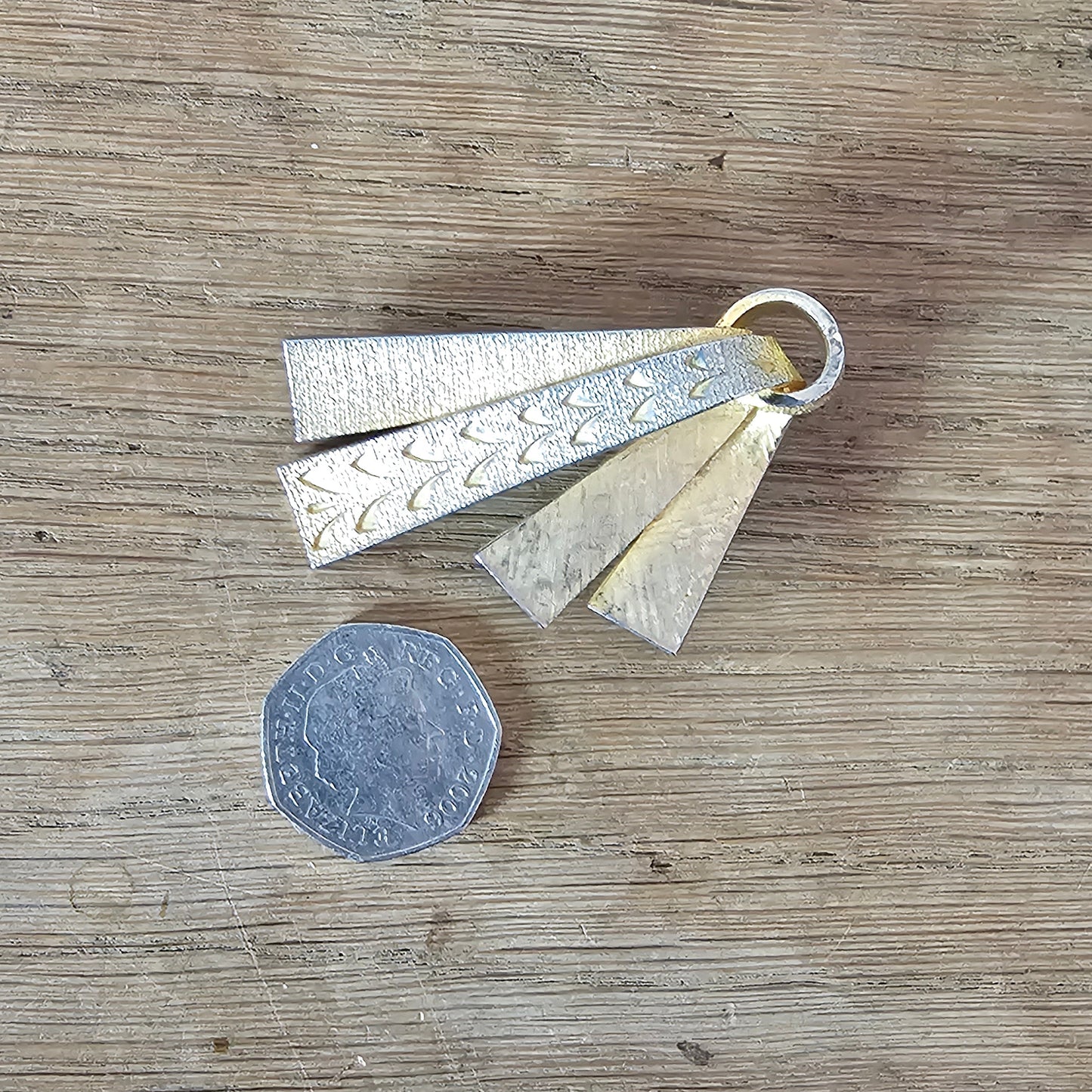 1960s Sphinx gold-tone engraved patterned ribbon brooch, stamped 1390