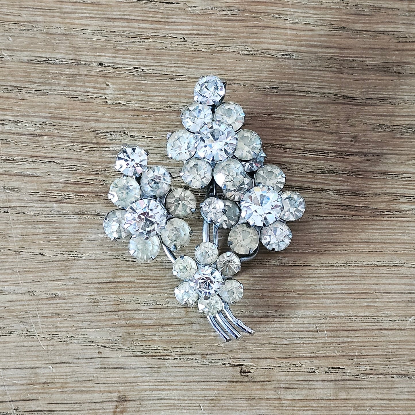 1950s silver-tone & rhinestone floral spray brooch