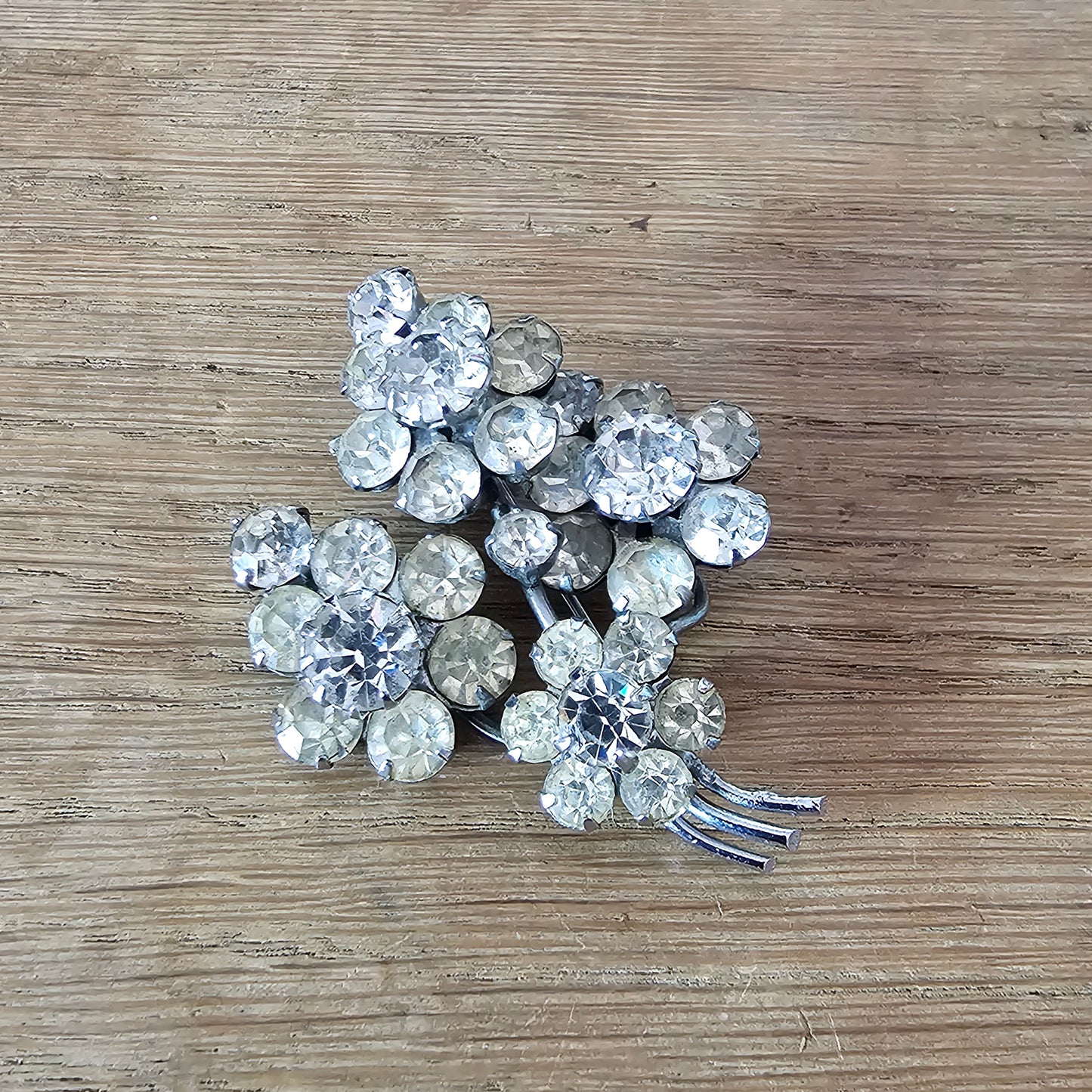 1950s silver-tone & rhinestone floral spray brooch