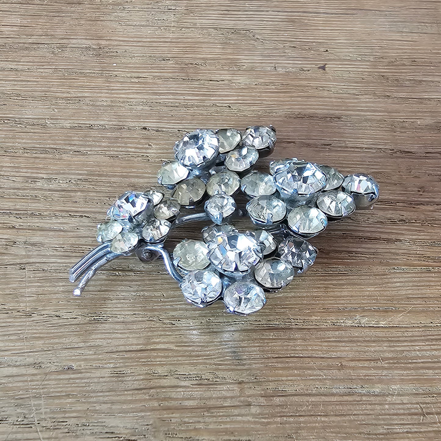 1950s silver-tone & rhinestone floral spray brooch