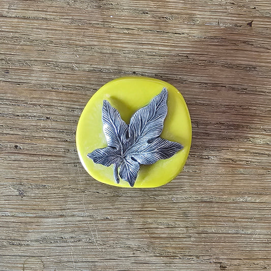 Home-made brooch using vintage silver-tone maple leaf & ochre-coloured flat bead