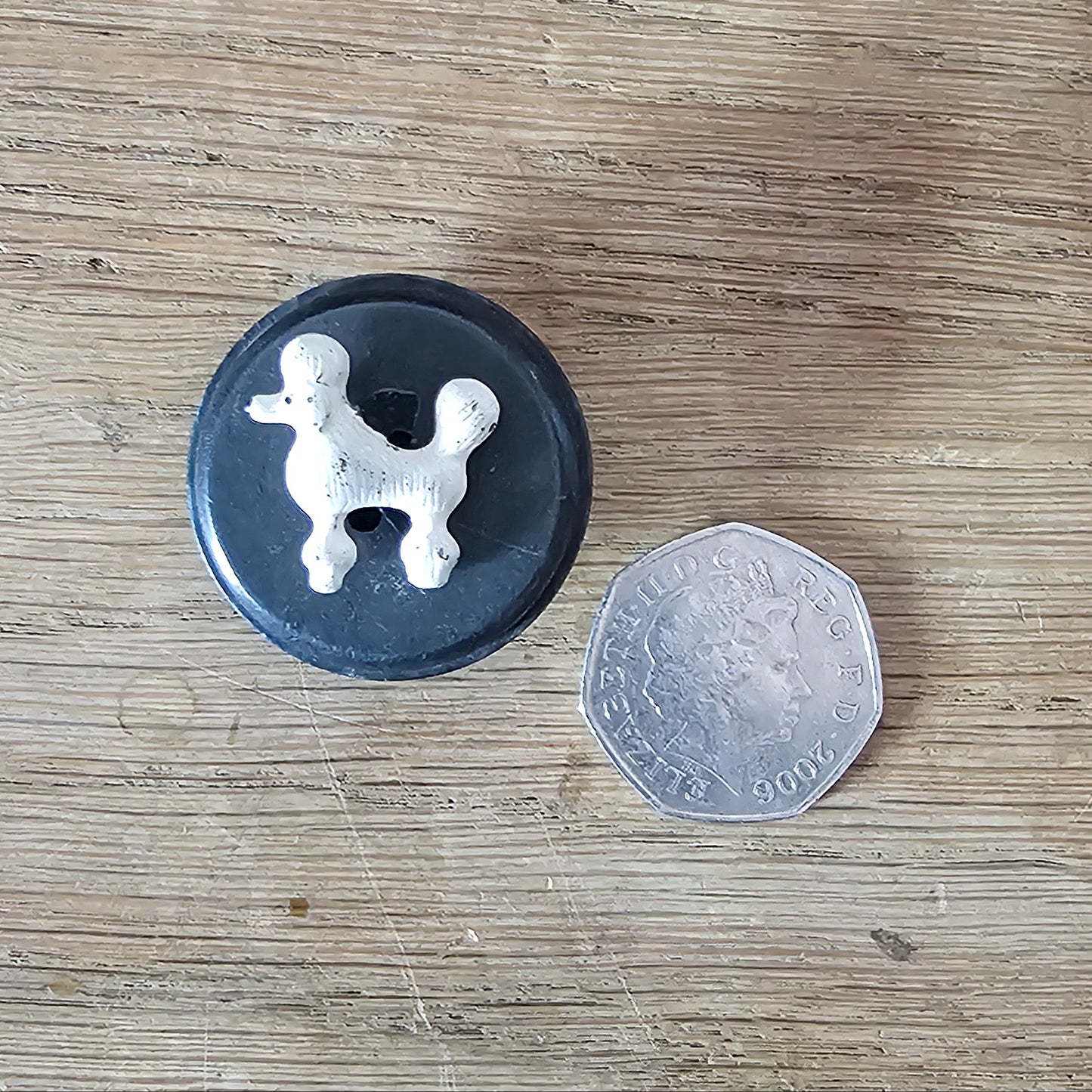 Home-made brooch using white painted metal poodle & vintage button