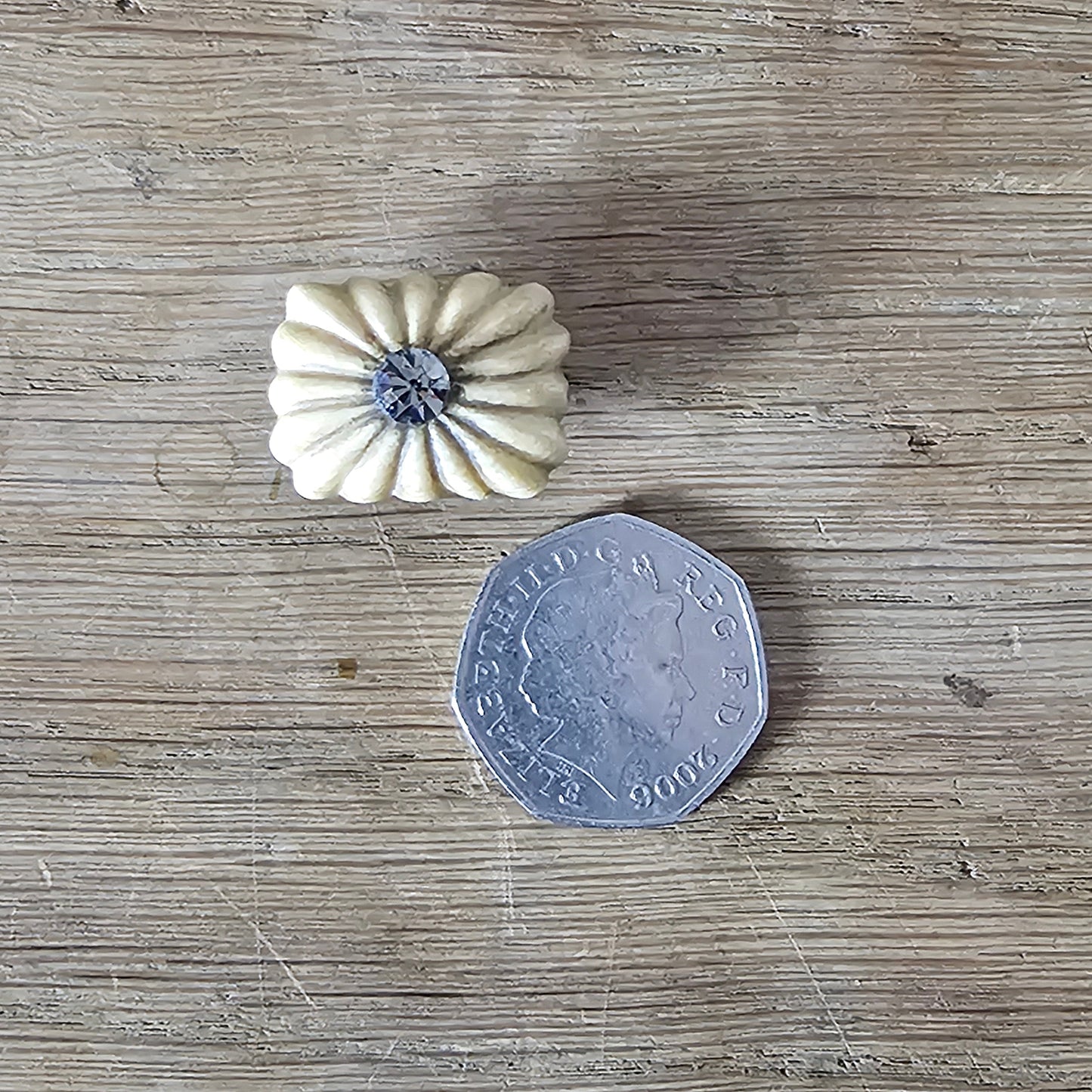 Home-made brooch using antique carved bone flower carving & rhinestone accent