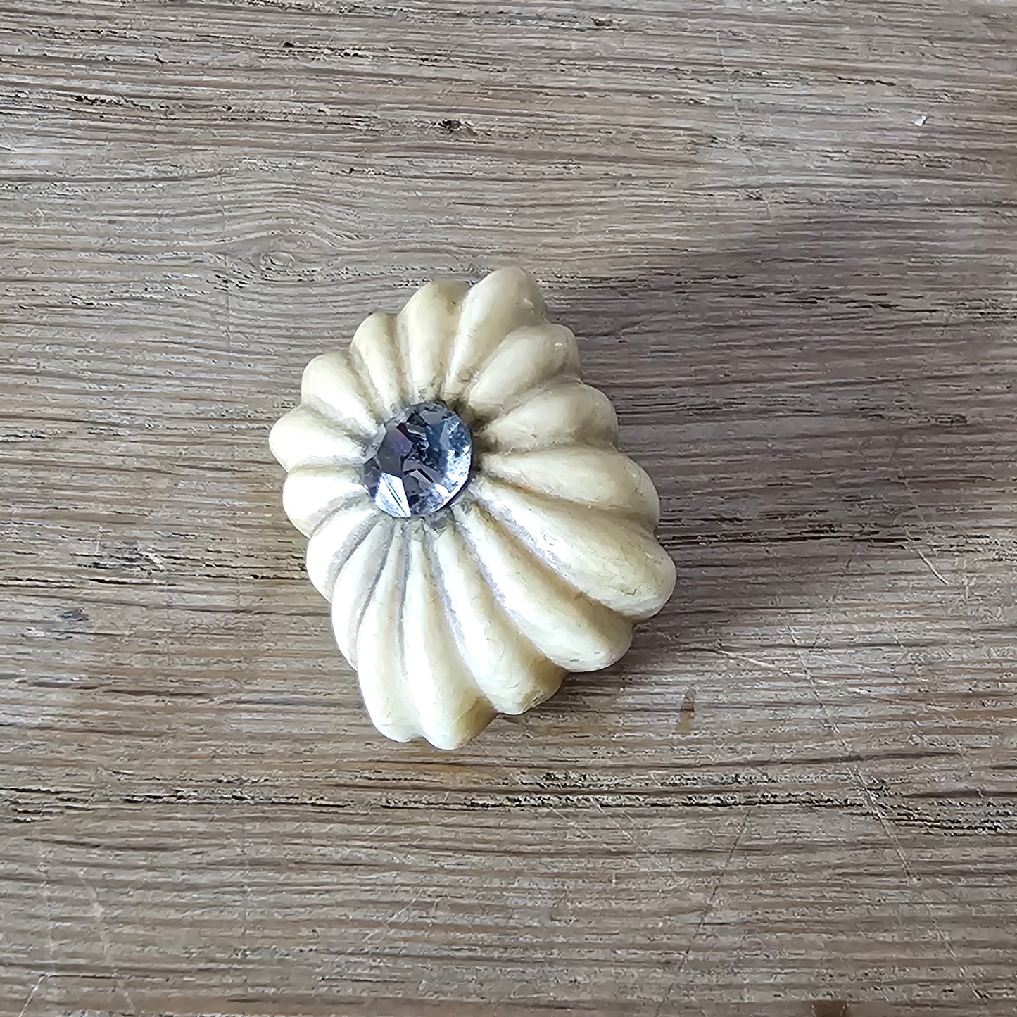 Home-made brooch using antique carved bone flower carving & rhinestone accent