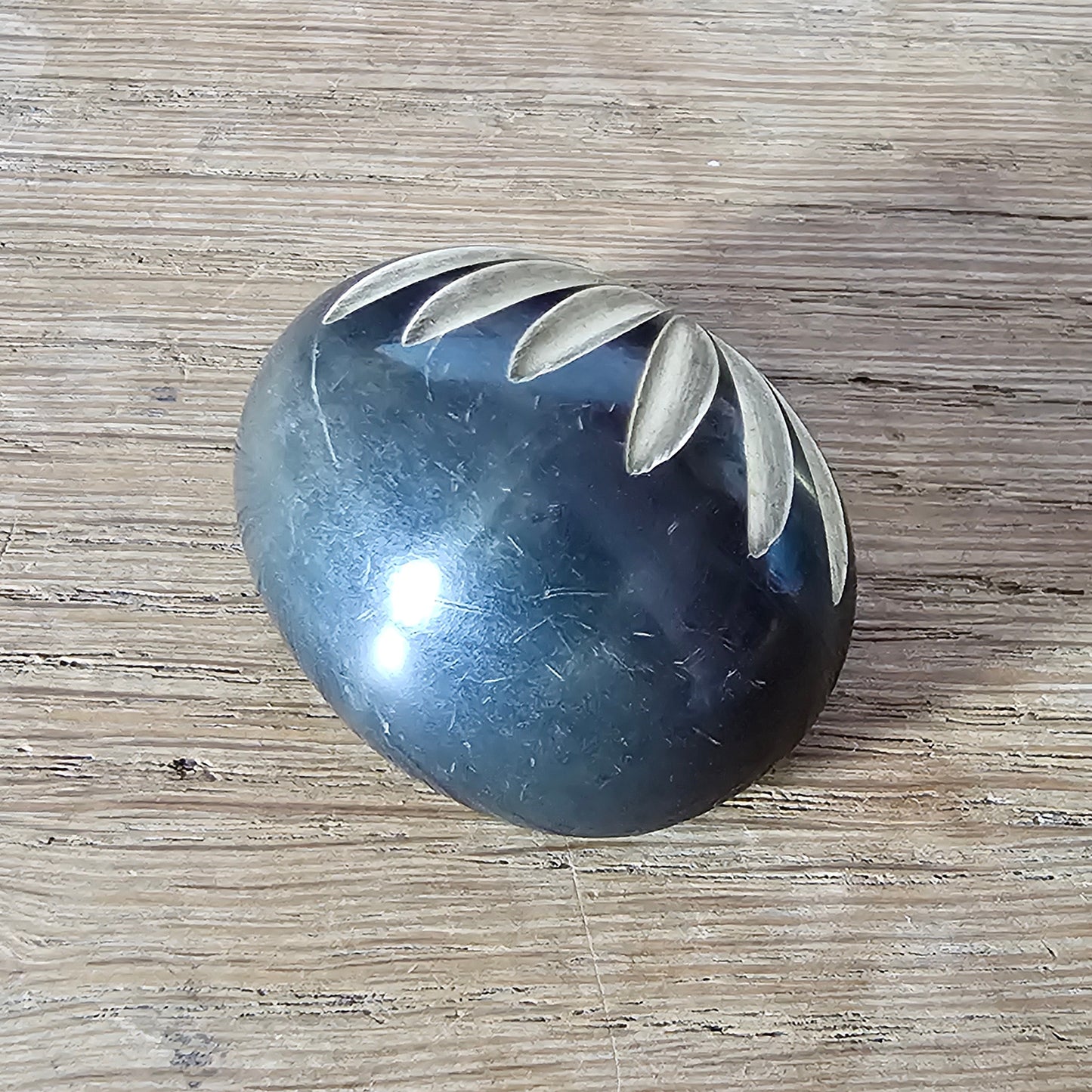 Home-made brooch using vintage carved bone sunburst cabochon