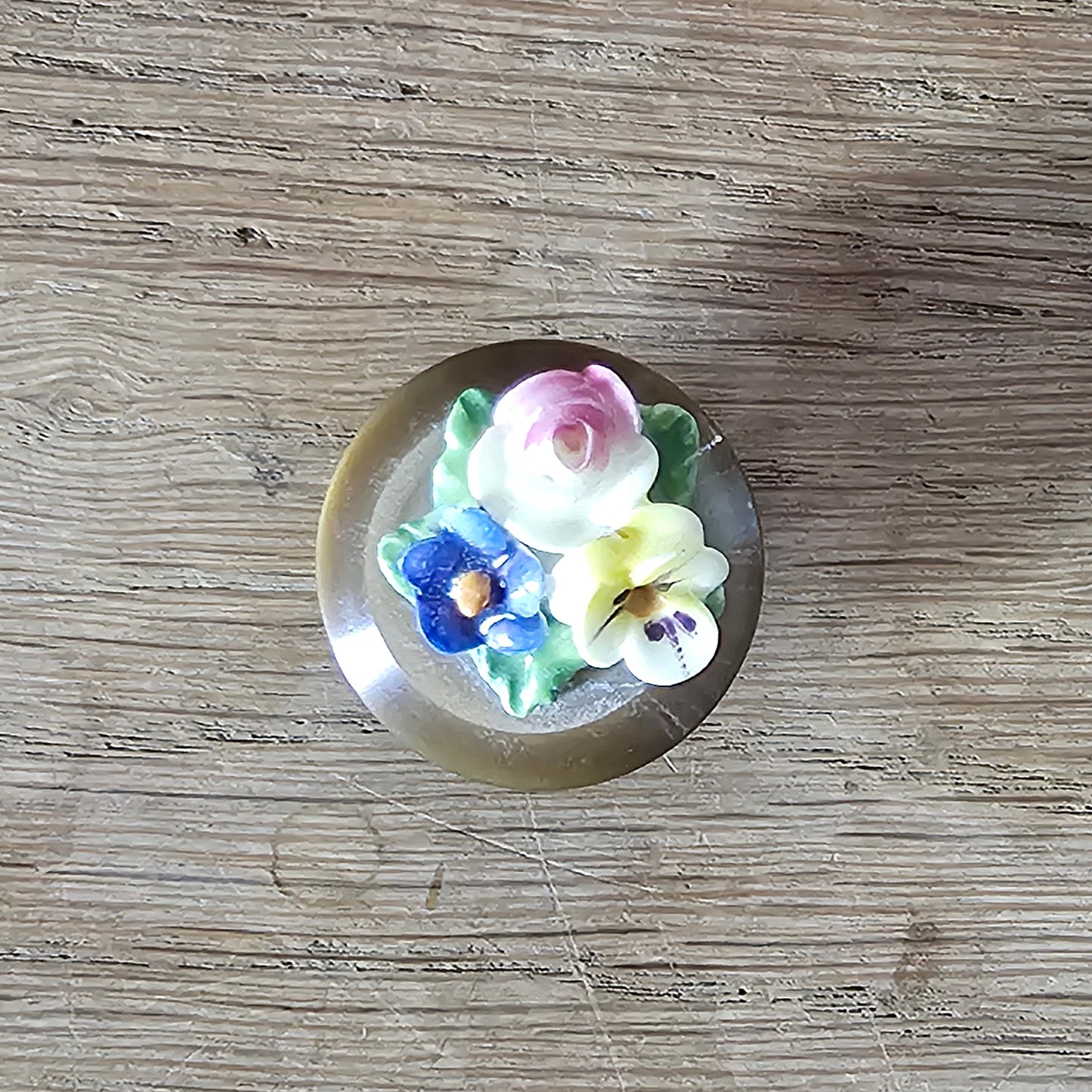 Home-made brooch using vintage china flowers and vintage button