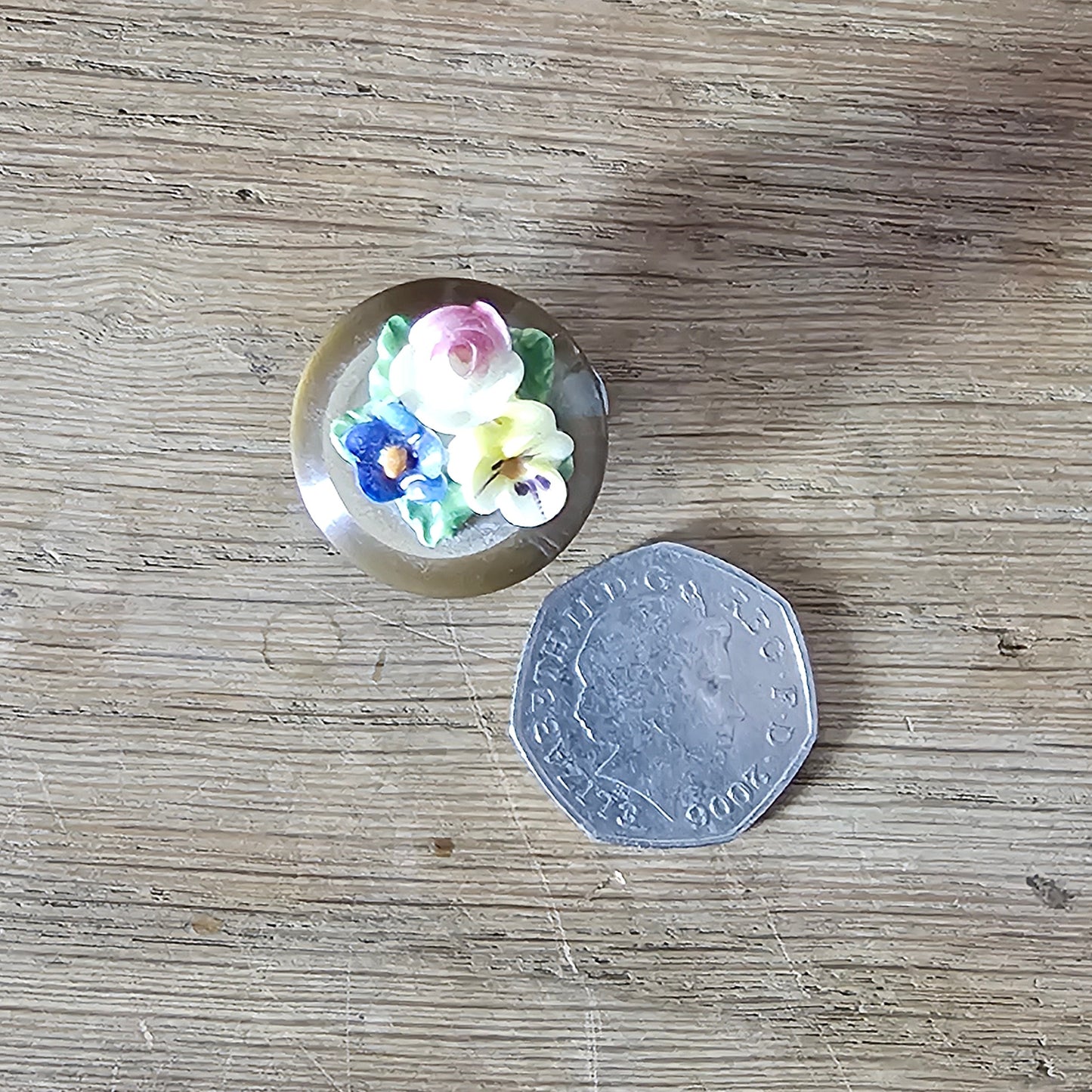 Home-made brooch using vintage china flowers and vintage button