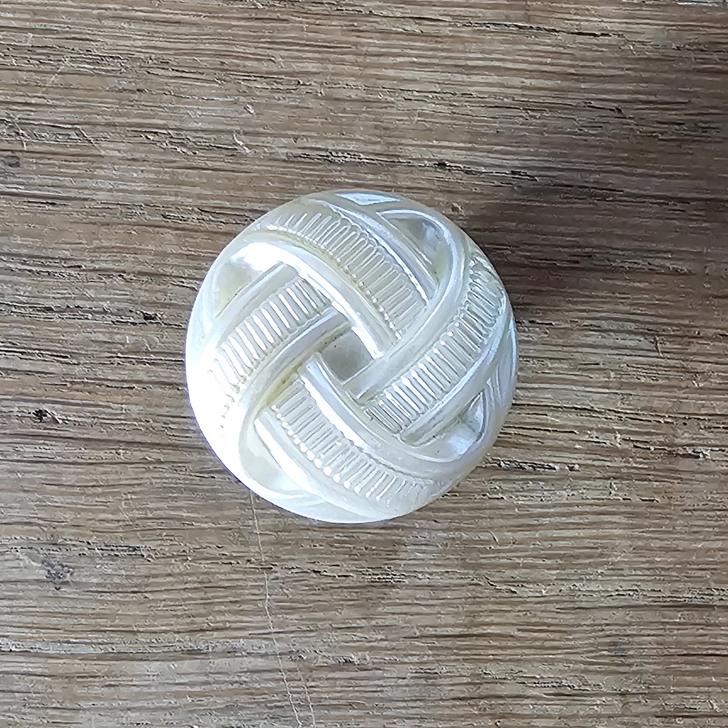 Home-made brooch using vintage plastic ivory coloured knot button