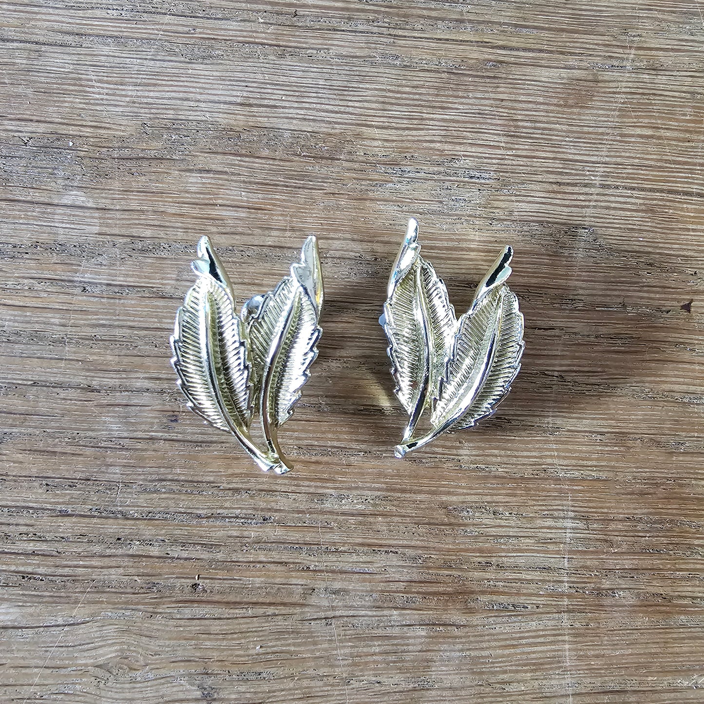 1960s Jewelcraft gold tone leaf clip on earrings