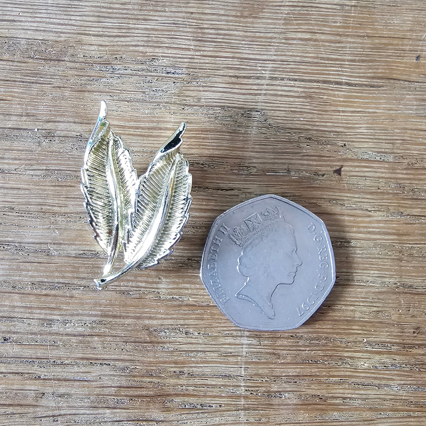 1960s Jewelcraft gold tone leaf clip on earrings