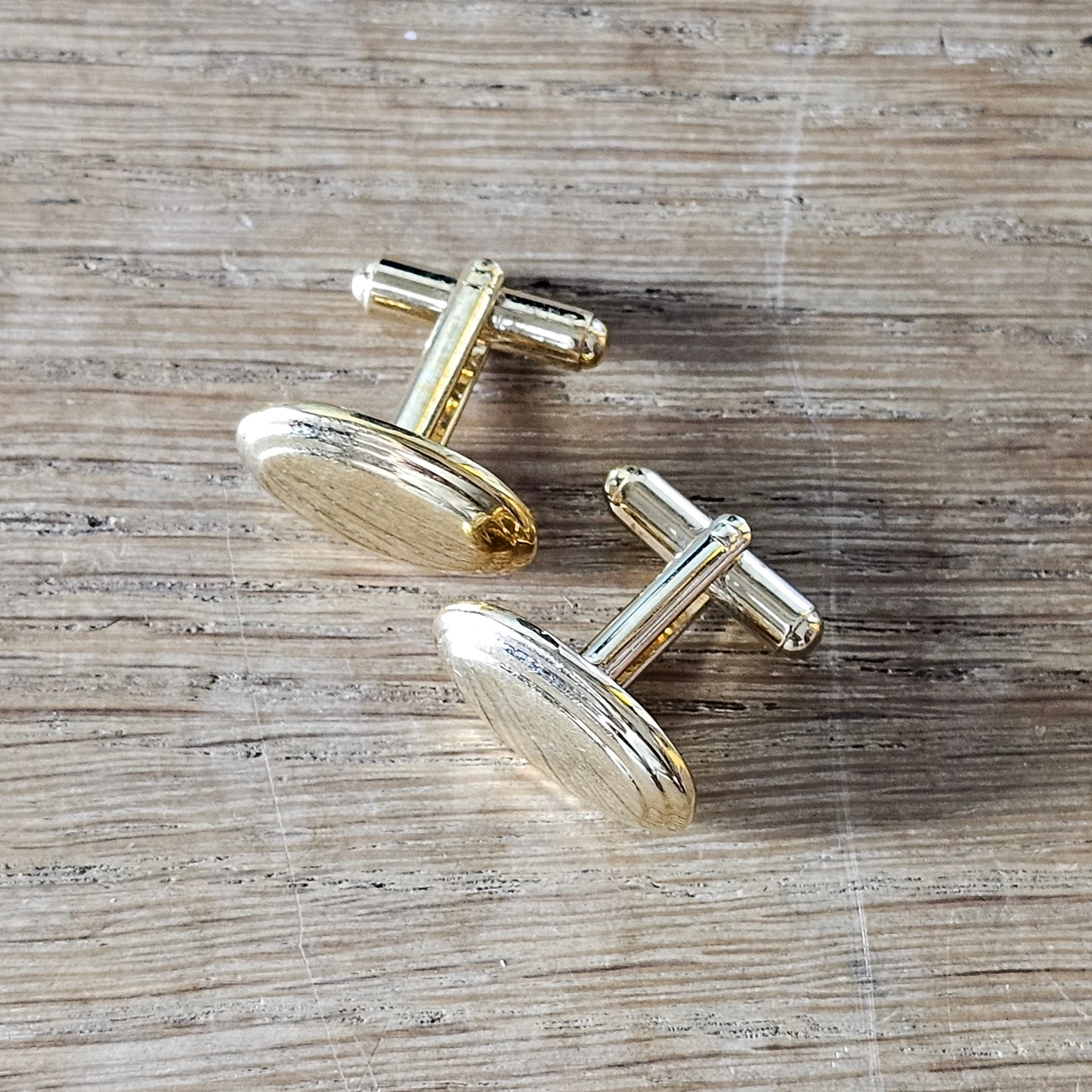 Y2K polished gold-tone oval cufflinks