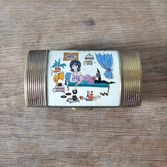 1950s gold-tone cigarette case with novelty lady listening to records motif