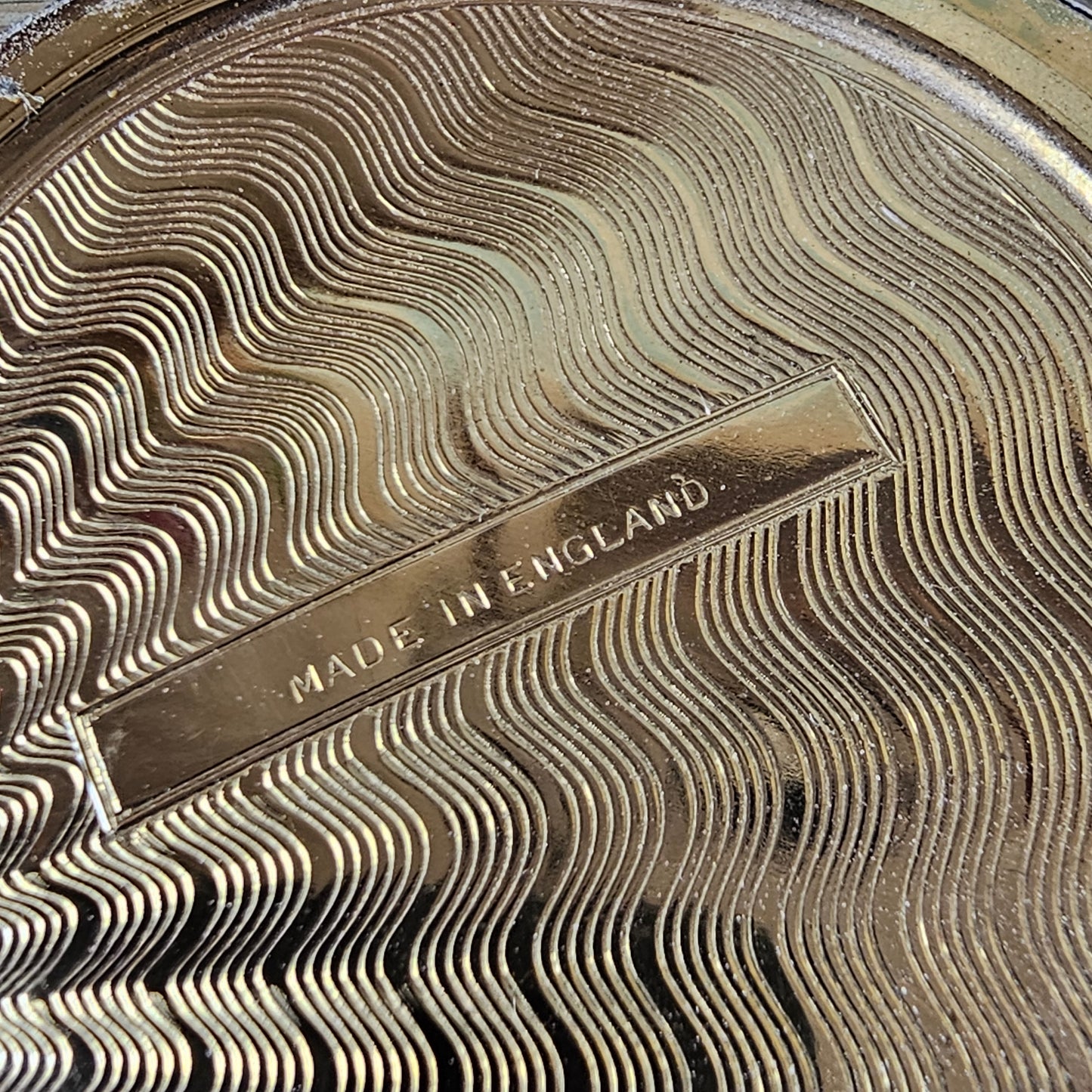1950s gold-tone powder compact with floral transfer decoration