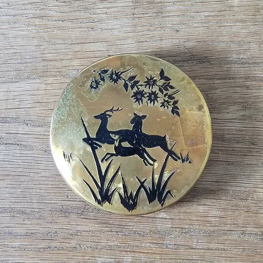 1950s gold-tone powder compact with deer silhouette design