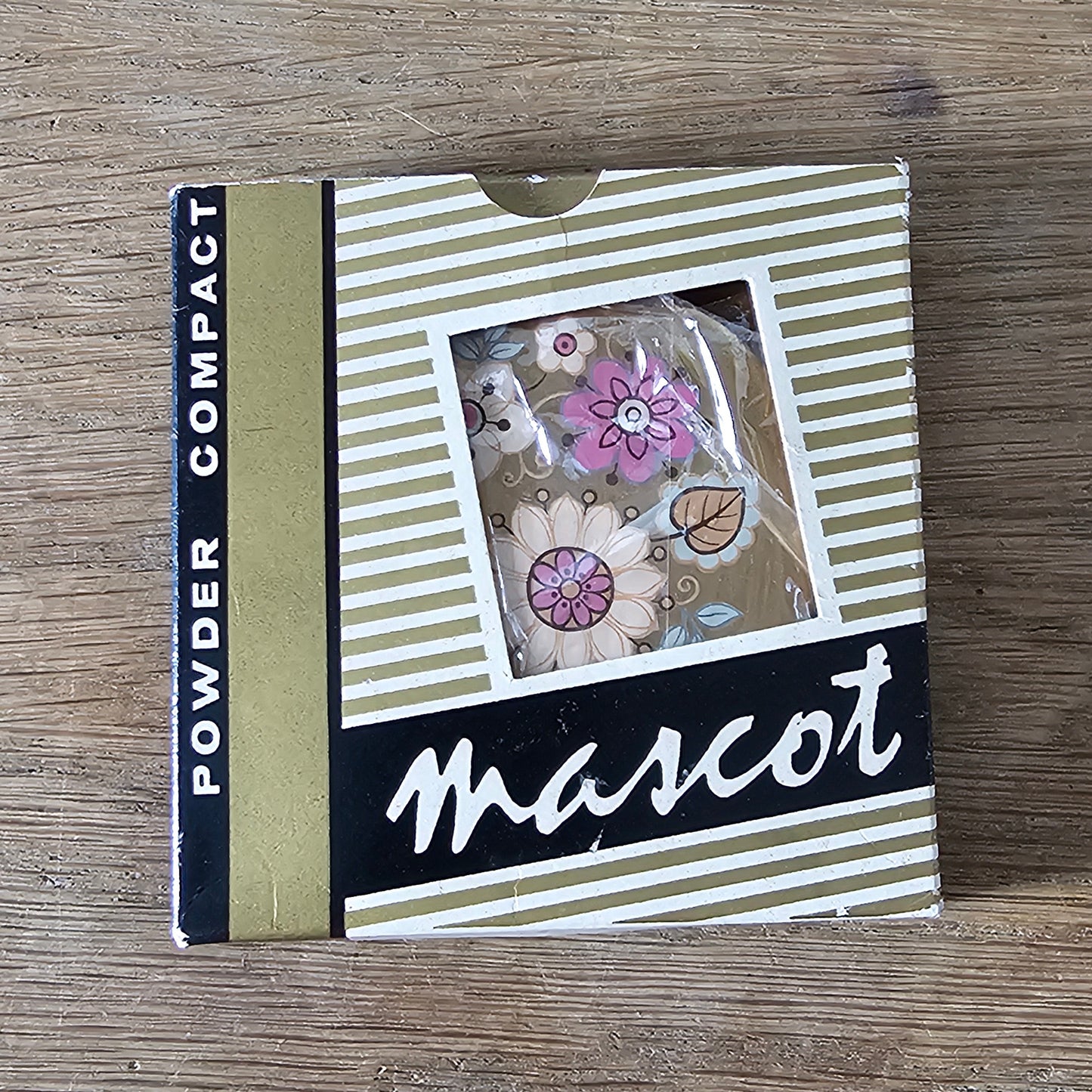 1960s unused Mascot gold-tone floral powder compact